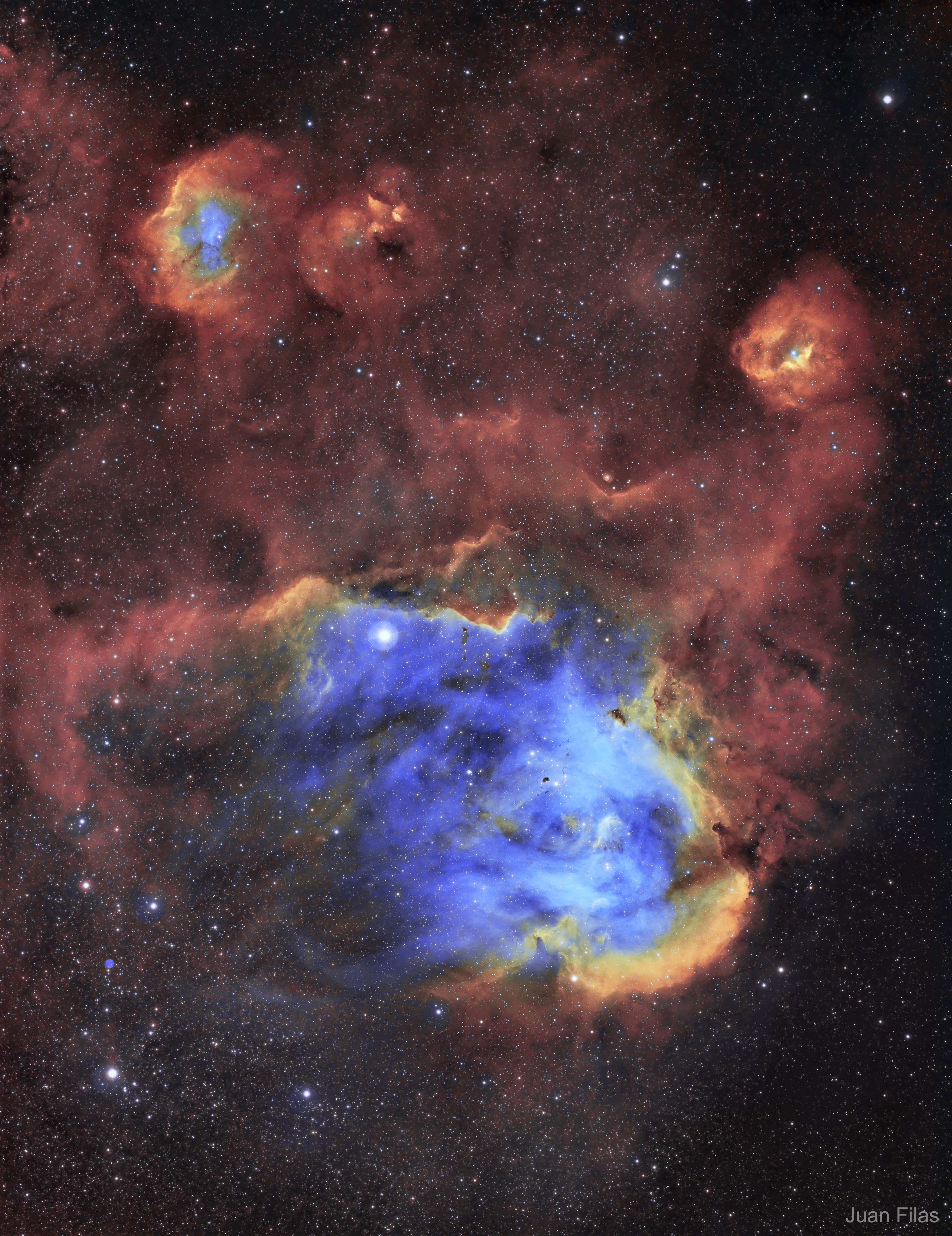 To some, it looks like a giant chicken running across the sky. To others, it looks like a gaseous nebula where star formation takes place. Cataloged as IC 2944, the Running Chicken Nebula spans about 100 light years and lies about 6,000 light years away toward the constellation of the Centaur (Centaurus).  The featured image, shown in scientifically assigned colors, was captured recently in a 12-hour exposure. The star cluster Collinder 249 is visible embedded in the nebula's glowing gas.  Although difficult to discern here, several dark molecular clouds with distinct shapes can be found inside the nebula.