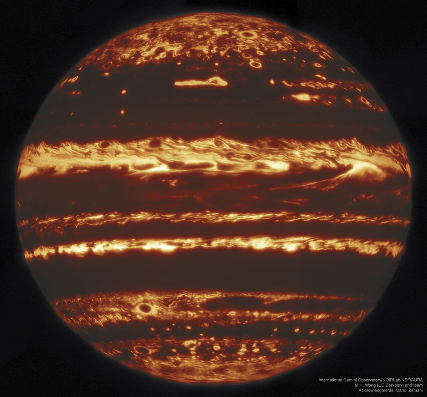 In infrared, Jupiter lights up the night.  Recently, astronomers at the Gemini North Observatory in Hawaii, USA, created some of the best infrared photos of Jupiter ever taken from Earth’s surface, pictured.  Gemini was able to produce such a clear image using a technique called lucky imaging, by taking many images and combining only the clearest ones that, by chance, were taken when Earth's atmosphere was the most calm.  Jupiter’s jack-o’-lantern-like appearance is caused by the planet’s different layers of clouds.  Infrared light can pass through clouds better than visible light, allowing us to see deeper, hotter layers of Jupiter's atmosphere, while the thickest clouds appear dark.  These pictures, together with ones from the Hubble Space Telescope and the Juno spacecraft, can tell us a lot about weather patterns on Jupiter, like where its massive, planet-sized storms form.   Notable APOD Submissions: Flower Moon 2020