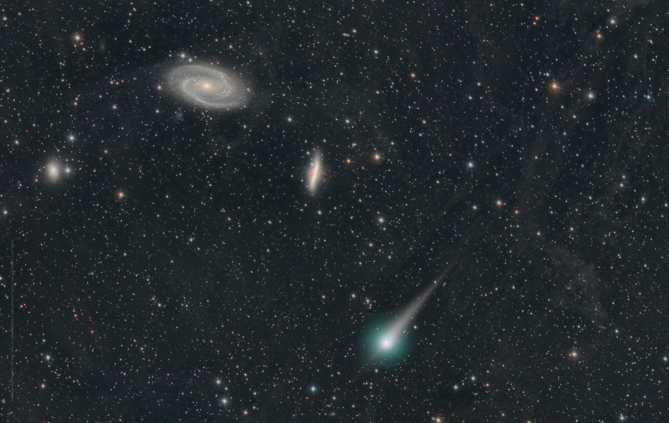 Comet PanSTARRs, C/2017 T2, shared this stunning telescopic field of view with galaxies M81 and M82 on May 22/23. Of course, the galaxies were some 12 million light-years distant and the comet about 14 light-minutes away, seen in planet Earth's sky toward the Big Dipper. A new visitor from the Oort Cloud, this Comet PanSTARRs was discovered in 2017 by the PanSTARRs survey telescope when the comet was over 1 light-hour from the Sun, almost as distant as the orbit of Saturn. With a beautiful coma and dust tail, this comet has been a solid northern hemisphere performer for telescope wielding comet watchers this May, following its closest approach to the Sun on May 4. In this deep image from dark California skies the outbound comet even seems to develop a short anti-tail as it leaves the inner Solar System.
