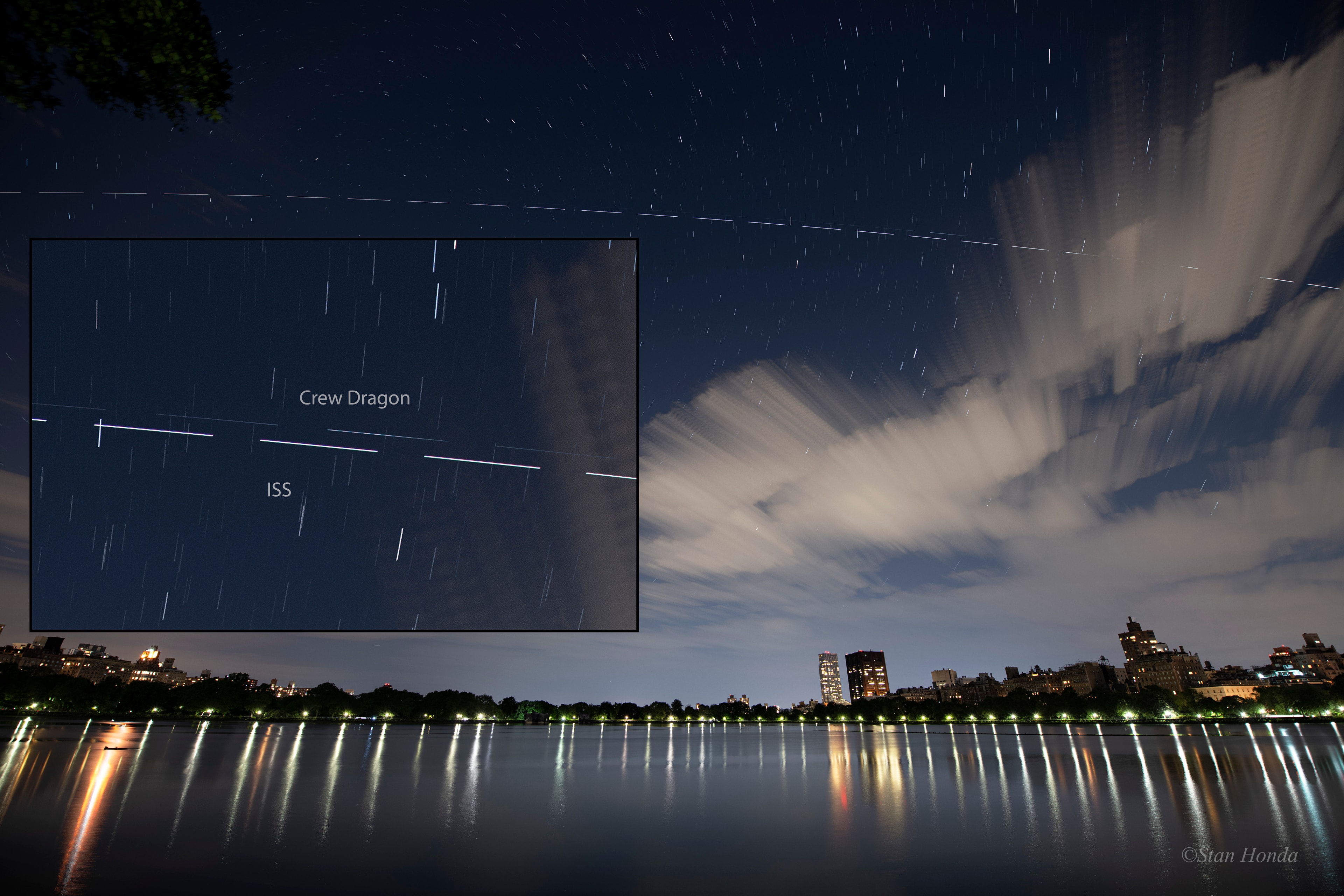 Still bathed in sunlight the International Space Station (ISS) arced through this Manhattan evening sky on May 30. Moving left to right, its bright trail was captured in this composite image with a series of 5 second long exposures. Stars left short trails and lights were reflected in still waters looking toward the north across the Central Park reservoir. Chasing the ISS in low Earth orbit the Crew Dragon spacecraft dubbed Endeavour also left a trail through that urban night. Seen about 6 hours after its launch the spacecraft's faint trail appears above the ISS, shown in the inset just as the two approached the bank of clouds at the right. Dragon Endeavour docked successfully with the ISS about nineteen hours after reaching orbit.