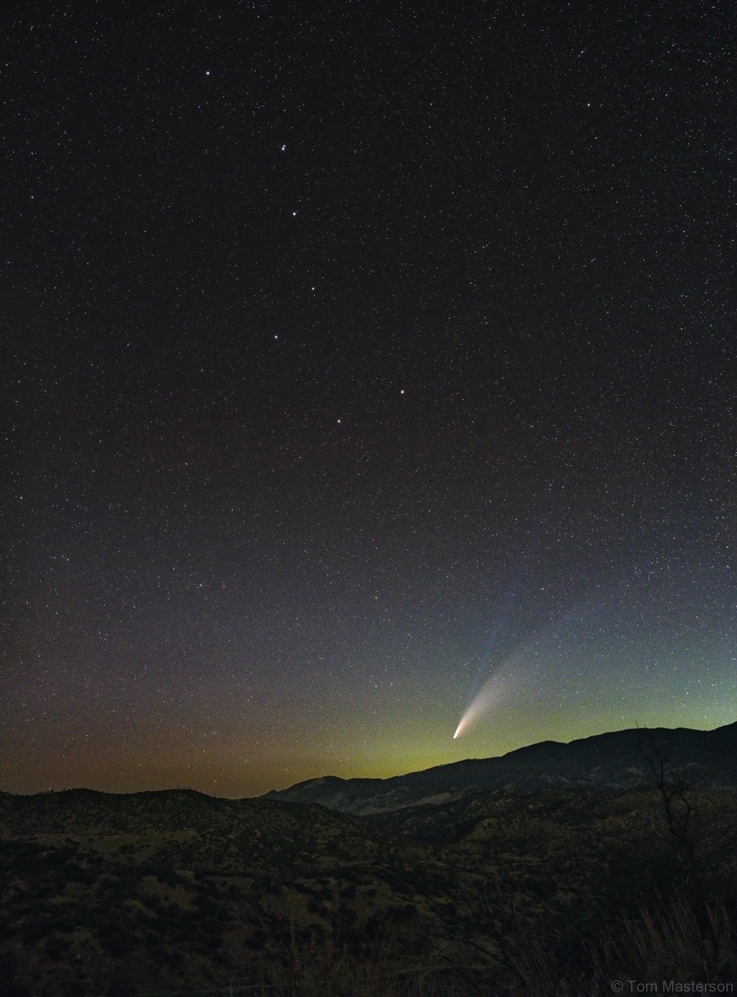 If you can see the stars of the Big Dipper, you can find comet NEOWISE in your evening sky tonight. After sunset look for the naked-eye comet below the bowl of the famous celestial kitchen utensil of the north and above your northwestern horizon. You're looking for a fuzzy 'star' with a tail, though probably not so long a tail as in this clear sky snapshot taken from Los Padres National Forest in California on the evening of July 16. Recent photographs of C/2020 F3 (NEOWISE) often show this comet's broad dust tail and fainter but separate ion tail extending farther than the eye can follow. Skygazers around the world have been delighted to find NEOWISE, surprise visitor from the outer Solar System.  Comet NEOWISE Images: July 17 | July 16 | July 15 | July 14 | July 13 | July 12 | July 11 | July 10 & earlier