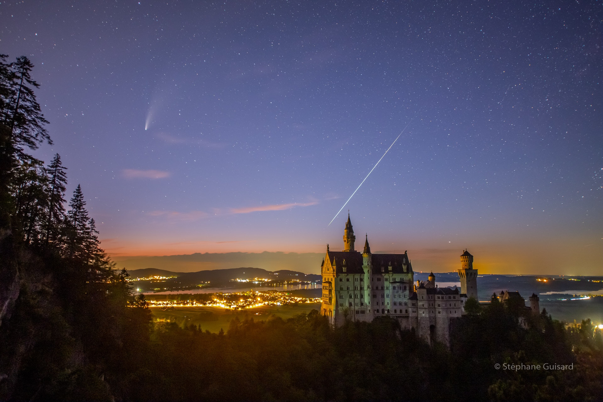 Comet dust falls through a twilight sky in this dream-like scene, but it's not part of a fairytale movie. Still, Castle Neuschwanstein, nestled in the Bavarian Alps, did inspire Disneyland's Sleeping Beauty Castle. Captured on July 20, the bright streak above the castle towers is likely a Perseid meteor. Though it peaks near mid-August, the annual summer meteor shower is active now. The meteor trail over the fairytale castle can be traced back to the shower's radiant in the heroic constellation Perseus off the top right of the frame. Perseid meteors are produced by dust from periodic Comet Swift-Tuttle. With its own broad dust tail now sweeping through northern skies the celestial apparition above the distant horizon is planet Earth's current darling, Comet NEOWISE.  Comet NEOWISE Images:  July  22 || 21 || 20 || 19  || 18   || 17   || 16   || 15  || 14  || 13  || 12  || 11  || 10 & earlier ||