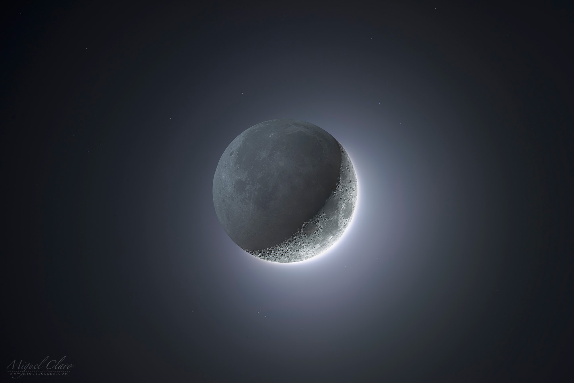 How come the crescent Moon doesn't look like this?  For one reason, because your eyes can't simultaneously discern bright and dark regions like this. Called earthshine or the da Vinci glow, the unlit part of a crescent Moon is visible but usually hard to see because it is much dimmer than the sunlit arc. In our digital age, however, the differences in brightness can be artificially reduced. The featured image is actually a digital composite of 15 short exposures of the bright crescent, and 14 longer exposures of the dim remainder.  The origin of the da Vinci glow, as explained by Leonardo da Vinci about 510 years ago, is sunlight reflected first by the Earth to the Moon, and then back from the Moon to the Earth.
