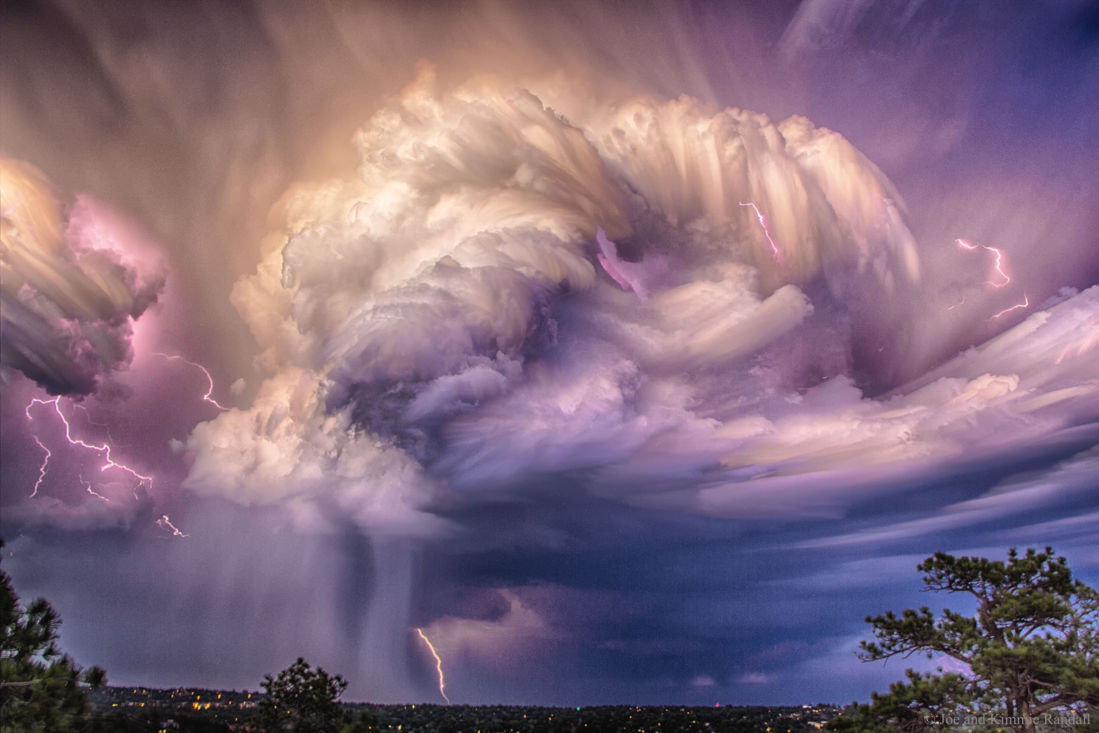 Have you ever watched a lightning storm in awe?  Join the crowd. Oddly, details about how lightning is produced remains a topic of research. What is known is that updrafts carry light ice crystals into collisions with larger and softer ice balls, causing the smaller crystals to become positively charged.  After enough charge becomes separated, the rapid electrical discharge that is lightning occurs. Lightning usually takes a jagged course, rapidly heating a thin column of air to about three times the surface temperature of the Sun.  The resulting shock wave starts supersonically and decays into the loud sound known as thunder.  Lightning bolts are common in clouds during rainstorms, and on average 44 lightning bolts occur on the  Earth every second. Pictured, over 60 images were stacked to capture the flow of lightning-producing storm clouds in July over Colorado Springs, Colorado, USA.    Follow APOD in English on: Facebook,  Instagram, or Twitter