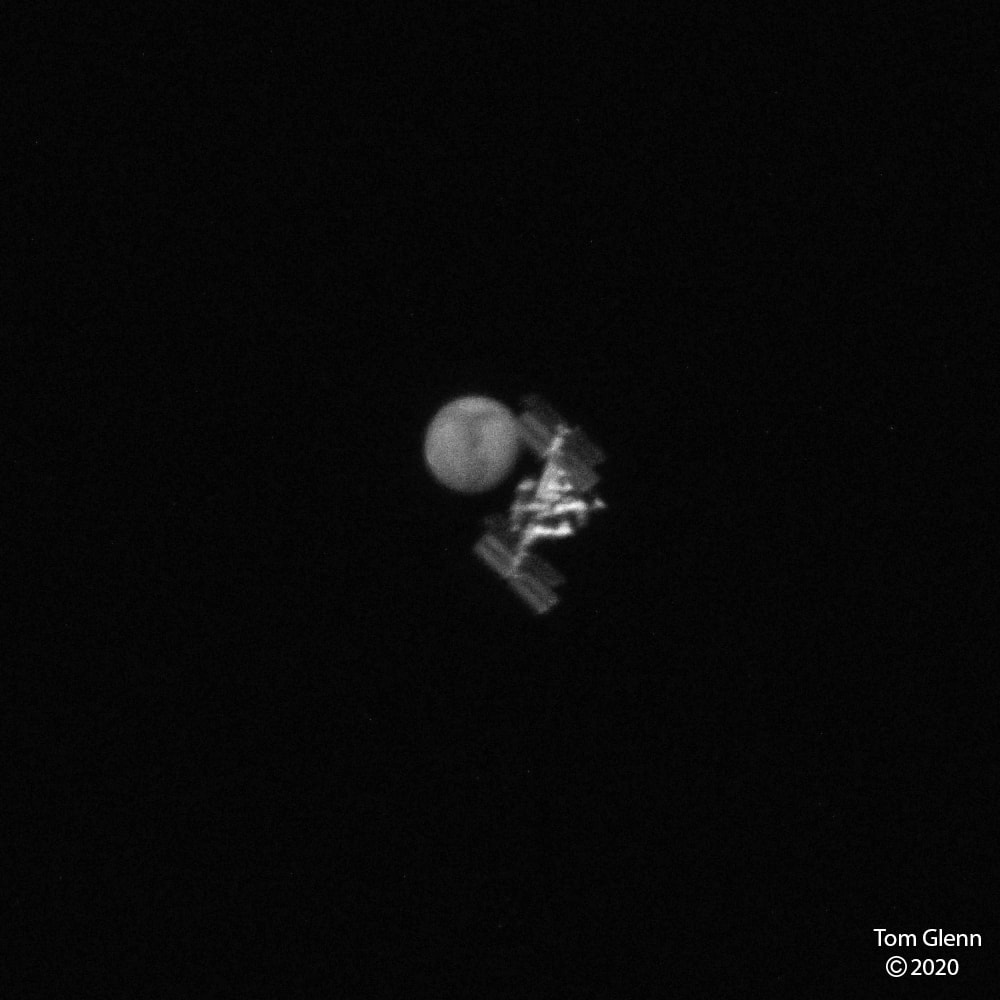 Yes, but have you ever seen the space station do this? If you know when and where to look, watching the bright International Space Station (ISS) drift across your night sky is a fascinating sight -- but not very unusual.  Images of the ISS crossing in front of the half-degree Moon or Sun do exist, but are somewhat rare as they take planning, timing, and patience to acquire.  Catching the ISS crossing in front of minuscule Mars, though, is on another level. Using online software, the featured photographer learned that the unusual transit would be visible only momentarily along a very narrow stretch of nearby land spanning just 90 meters.  Within this stretch, the equivalent ground velocity of the passing ISS image would be a quick 7.4 kilometers per second. However, with a standard camera, a small telescope, an exact location to set up his equipment, an exact direction to point the telescope, and sub-millisecond timing -- he created a video from which the featured 0.00035 second exposure was extracted.  In the resulting image capture, details on both Mars and the ISS are visible simultaneously.  The featured image was acquired last Monday at 05:15:47 local time from just northeast of San Diego, California, USA.  Although typically much smaller, angularly, than the ISS, Mars is approaching its maximum angular size in the next few weeks, because the blue planet (Earth) is set to pass its closest to the red planet (Mars) in their respective orbits around the Sun.    Portal Universe: Random APOD Generator