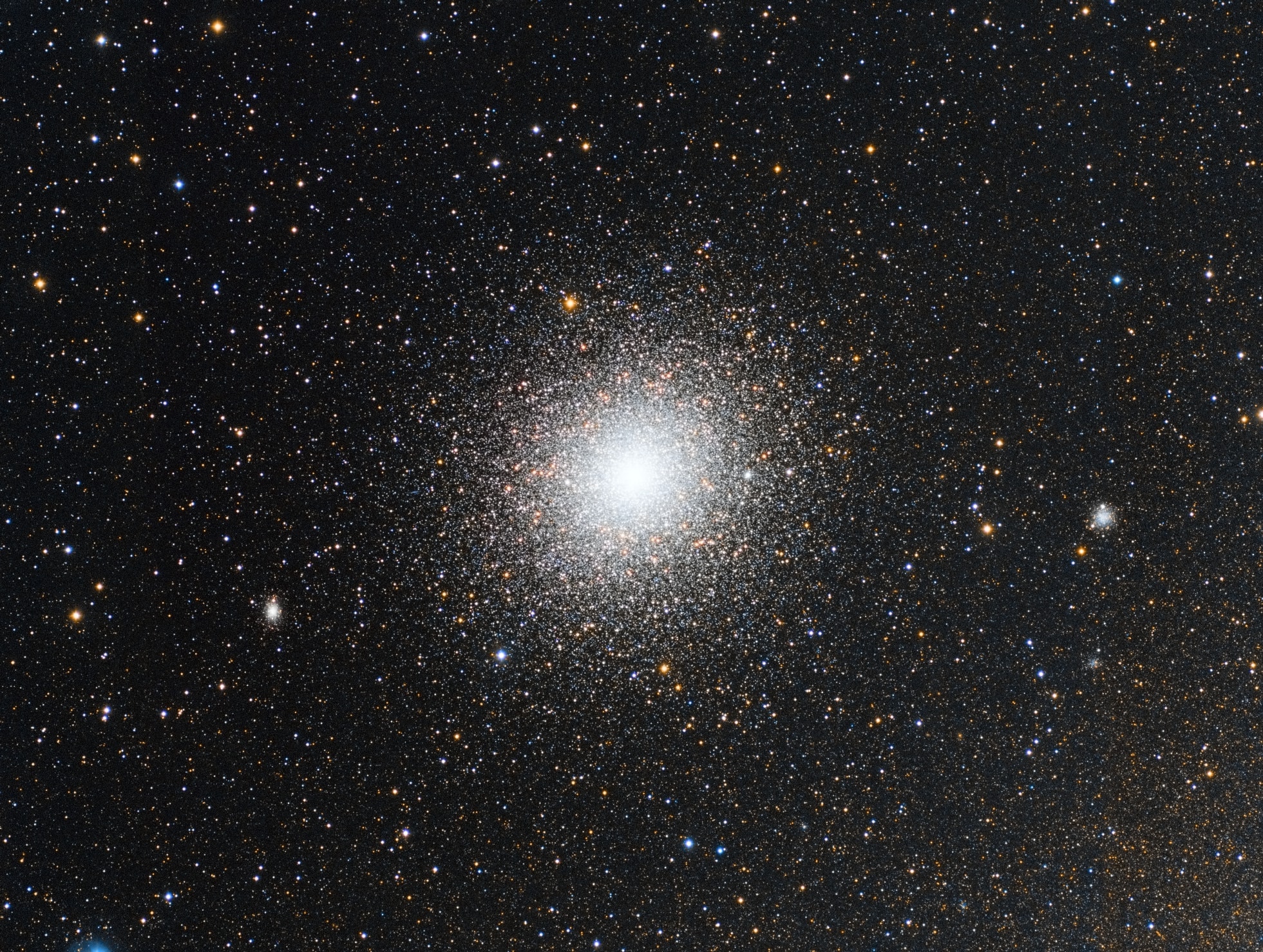 Globular star cluster 47 Tucanae is a jewel of the southern sky. Also known as NGC 104, it roams the halo of our Milky Way Galaxy along with some 200 other globular star clusters. The second brightest globular cluster (after Omega Centauri) as seen from planet Earth, it lies about 13,000 light-years away and can be spotted naked-eye close on the sky to the Small Magellanic Cloud in the constellation of the Toucan. The dense cluster is made up of hundreds of thousands of stars in a volume only about 120 light-years across. Red giant stars on the outskirts of the cluster are easy to pick out as yellowish stars in this sharp telescopic portrait. Tightly packed globular cluster 47 Tuc is also home to a star with the closest known orbit around a black hole.