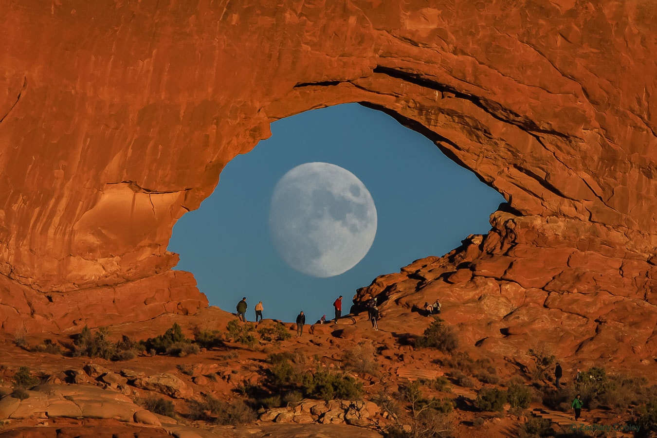 Who's watching whom?  The featured image of the Moon through a gap in a wall of rock may appear like a giant eye looking back at you.  Although, in late October, it took only a single exposure to capture this visual double, it also took a lot of  planning.  The photographic goal was achieved by precise timing -- needed for a nearly full moon to appear through the eye-shaped arch, by precise locating -- needed for the angular size of the Moon to fit iconically inside the rock arch, and by good luck -- needed for a clear sky and for the entire scheme to work. The seemingly coincidental juxtaposition was actually engineered with the help of three smartphone apps.  The pictured sandstone arch, carved by erosion, is millions of years old and just one of thousands of natural rock arches that have been found in Arches National Park near Moab, Utah, USA.  Contrastingly, the pictured Moon can be found up in the sky from just about anywhere on Earth, about half the time.