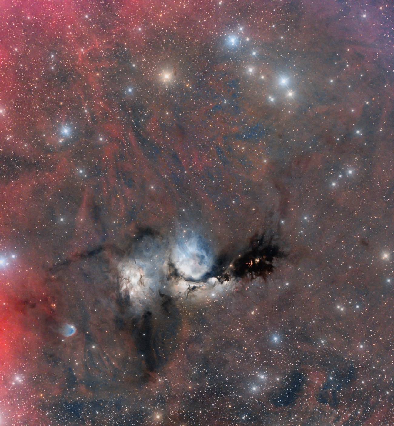Interstellar dust clouds and glowing nebulae abound in the fertile constellation of Orion. One of the brightest, M78, is centered in this colorful, wide field view, covering an area north of Orion's belt. At a distance of about 1,500 light-years, the bluish reflection nebula is around 5 light-years across. Its tint is due to dust preferentially reflecting the blue light of hot, young stars. Reflection nebula NGC 2071 is just to the left of M78. Flecks of emission from Herbig-Haro objects, energetic jets from stars in the process of formation, stand out against the dark dust lanes. The exposure also brings out the region's fainter, pervasive reddish glow of atomic hydrogen gas.