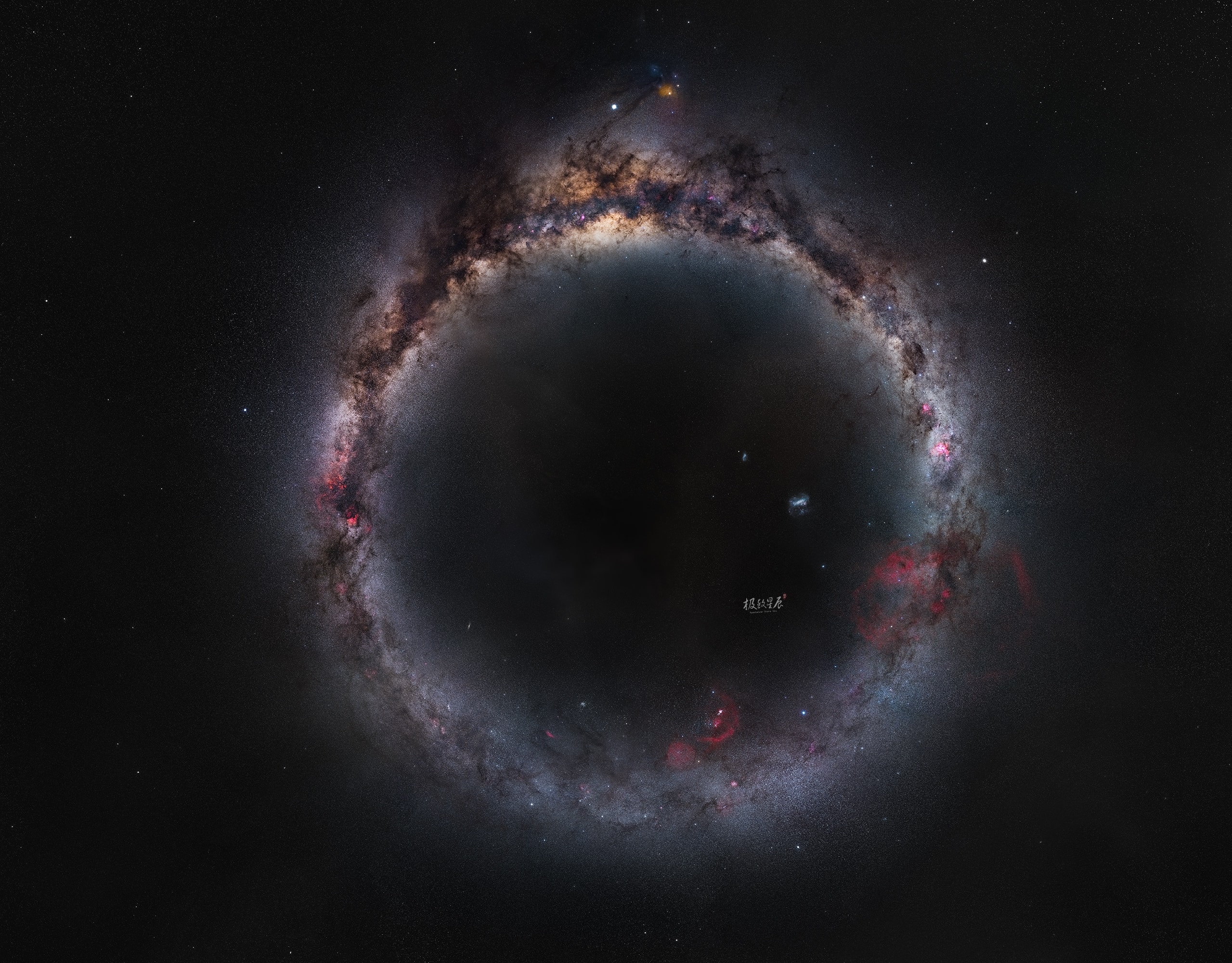 An expanse of cosmic dust, stars and nebulae along the plane of our Milky Way galaxy form a beautiful ring in this projected all-sky view. The creative panorama covers the entire galaxy visible from planet Earth, an ambitious 360 degree mosaic that took two years to complete. Northern hemisphere sites in western China and southern hemisphere sites in New Zealand were used to collect the image data. Like a glowing jewel set in the milky ring, the bulge of the galactic center, is at the very top. Bright planet Jupiter is the beacon just above the central bulge and left of red giant star Antares. Along the plane and almost 180 degrees from the galactic center, at the bottom of the ring is the area around Orion, denizen of the northern hemisphere's evening winter skies. In this projection the ring of the Milky Way encompasses two notable galaxies in southern skies, the large and small Magellanic clouds.