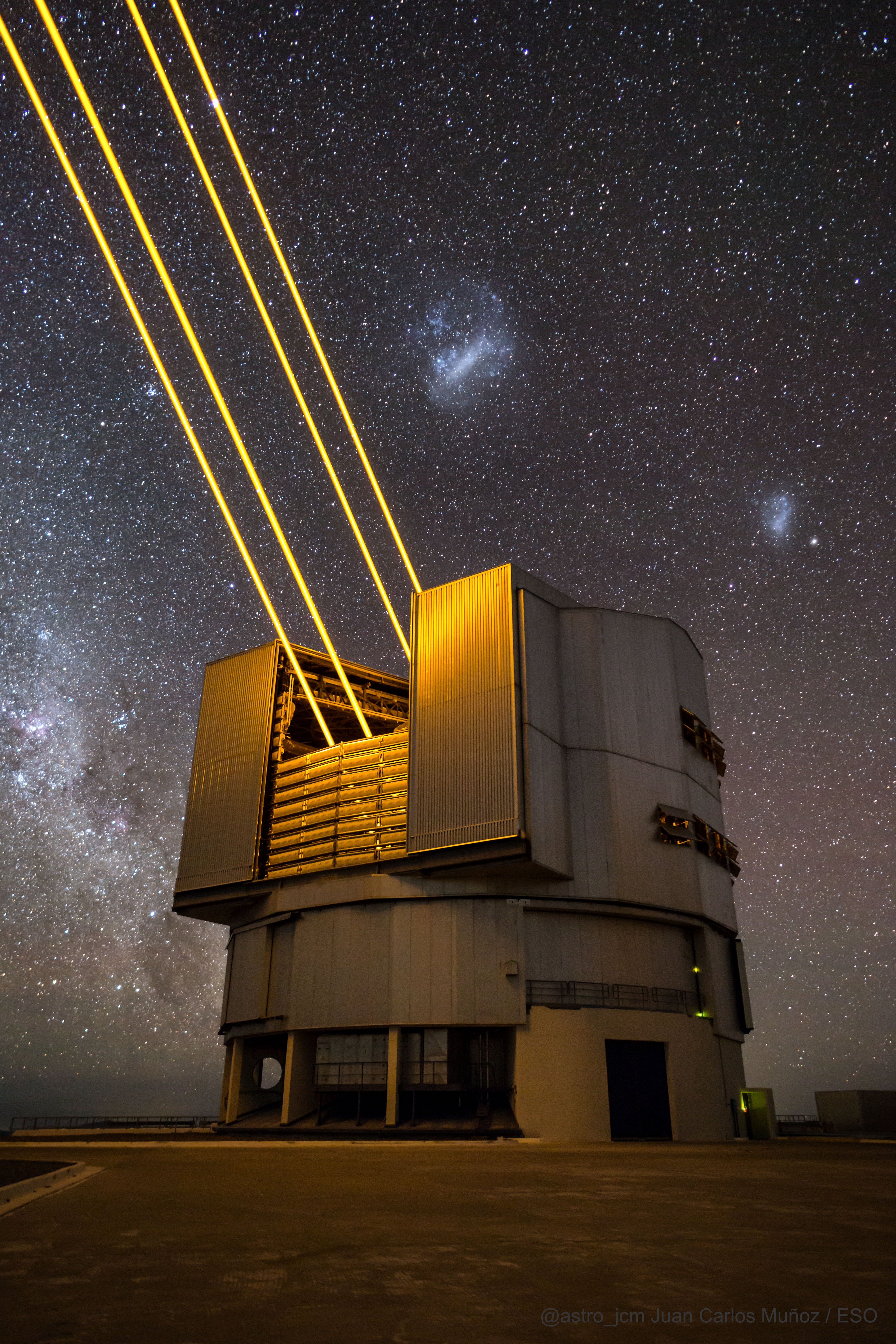 Why do stars twinkle? Our atmosphere is to blame as pockets of slightly off-temperature air, in constant motion, distort the light paths from distant astronomical objects. Atmospheric turbulence is a problem for astronomers because it blurs the images of the sources they want to study. The telescope featured in this image, located at ESO’s Paranal Observatory, is equipped with four lasers to combat this turbulence. The lasers are tuned to a color that excites atoms floating high in Earth's atmosphere -- sodium left by passing meteors. These glowing sodium spots act as artificial stars whose twinkling is immediately recorded and passed to a flexible mirror that deforms hundreds of times per second, counteracting atmospheric turbulence and resulting in crisper images. The de-twinkling of stars is a developing field of technology and allows, in some cases, Hubble-class images to be taken from the ground.  This technique has also led to spin-off applications in human vision science, where it is used to obtain very sharp images of the retina.