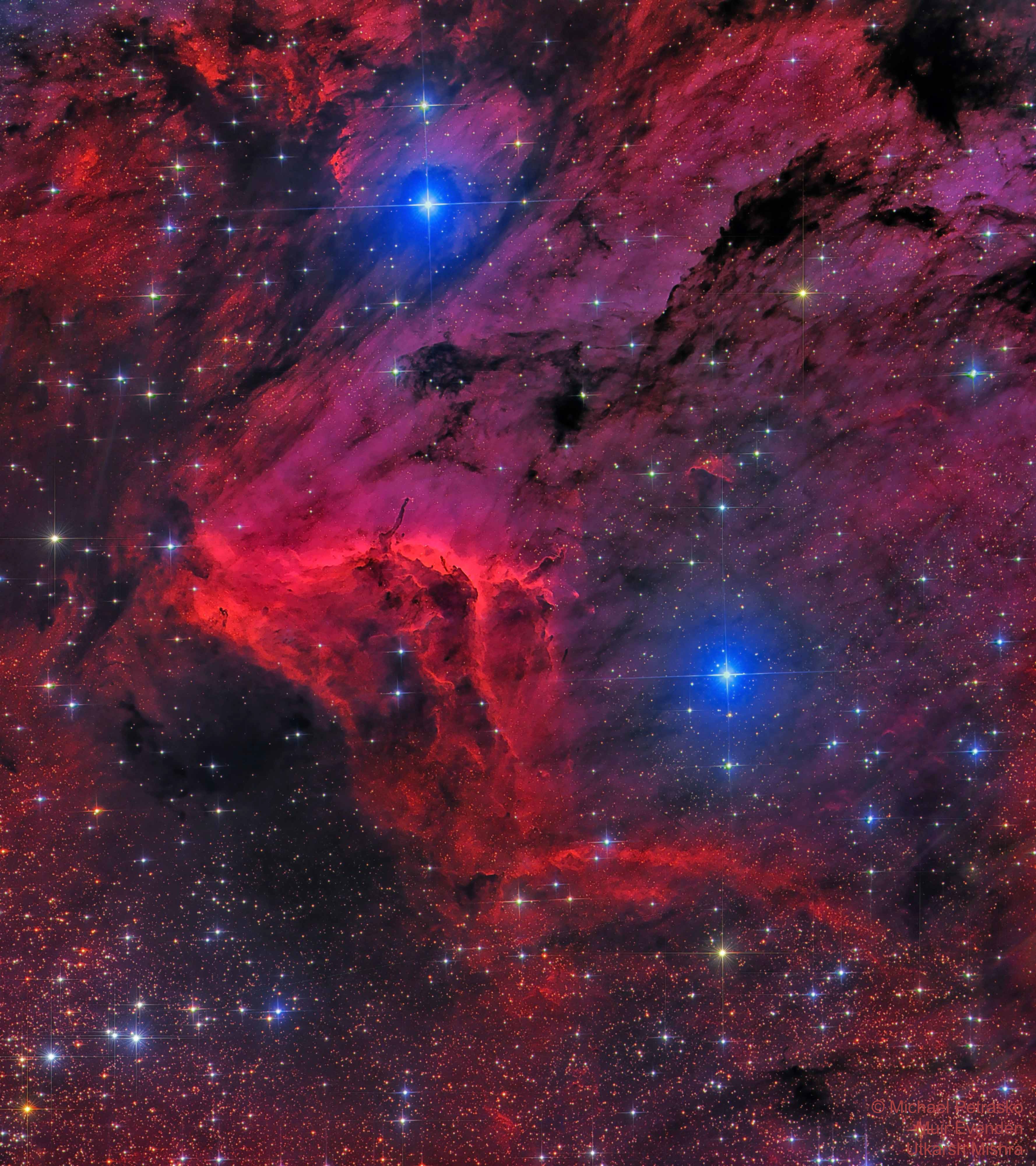 The Pelican Nebula is changing.   The entire nebula, officially designated IC 5070, is divided from the larger North America Nebula by a molecular cloud filled with dark dust.  The Pelican, however, is particularly interesting because it is an unusually active mix of star formation and evolving gas clouds.  The featured picture was processed to bring out two main colors, red and blue, with the red dominated by light emitted by interstellar hydrogen. Ultraviolet light emitted by young energetic stars is slowly transforming cold gas in the nebula to hot gas, with the advancing boundary between the two, known as an ionization front, visible in bright red across the image center. Particularly dense tentacles of cold gas remain.  Millions of years from now this nebula might no longer be known as the Pelican, as the balance and placement of stars and gas will surely leave something that appears completely different.   APOD in world languages: Arabic, Bulgarian, Catalan, Chinese (Beijing), Chinese (Taiwan), Croatian, Czech, Dutch, Farsi, French, German, Hebrew, Indonesian, Korean, Montenegrin, Polish, Russian, Serbian, Slovenian,  Spanish, Taiwanese, Turkish, Turkish, and  Ukrainian