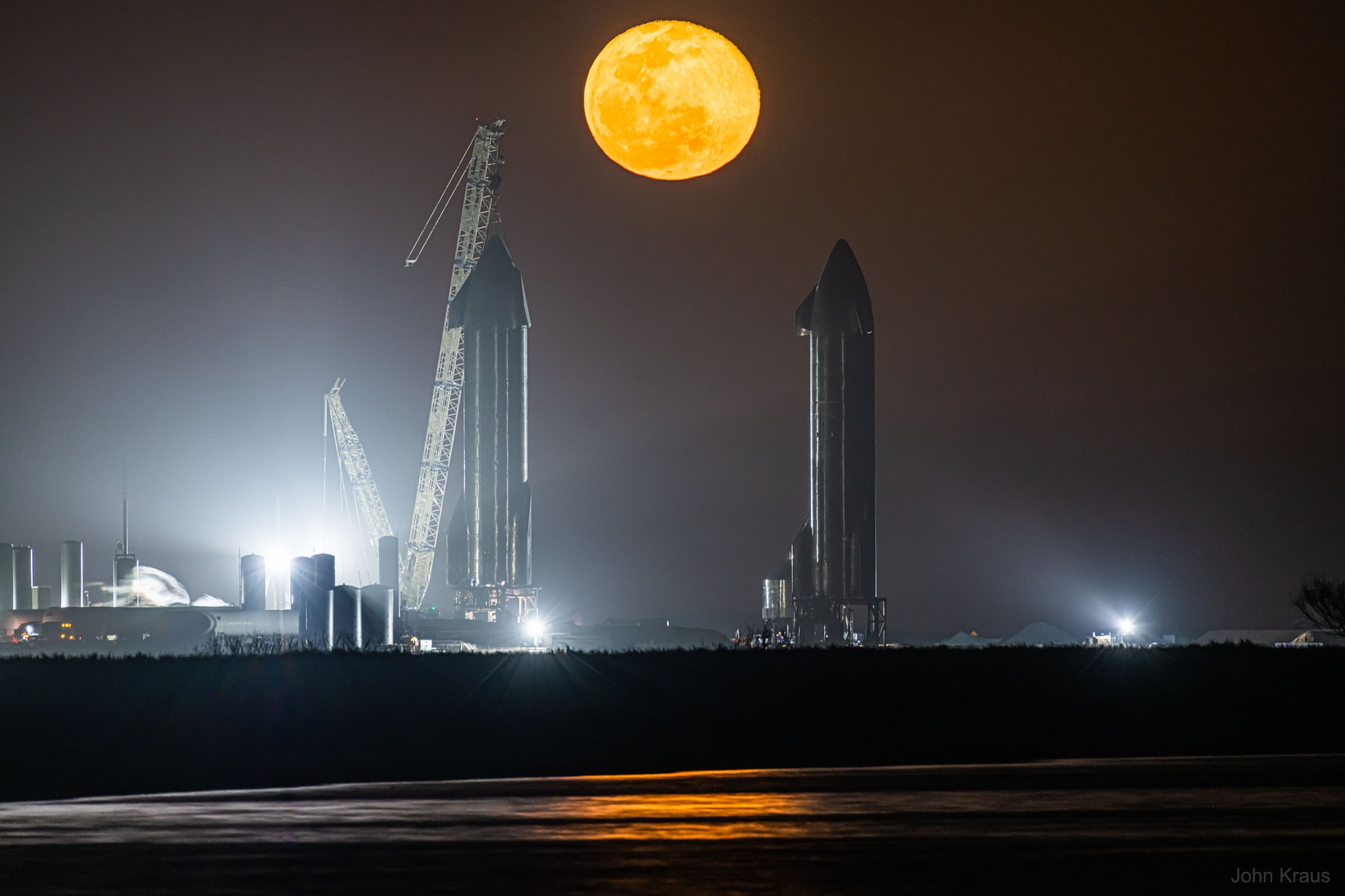 What's that on either side of the Moon? Starships. Specifically, they are launch-and-return reusable rockets being developed by SpaceX to lift cargo and eventually humans from the Earth's surface into space.  The two rockets pictured are SN9 (Serial Number 9) and SN10 which were captured near their Boca Chica, Texas launchpad last month posing below January's full Wolf Moon. The Starships house liquid-methane engines inside rugged stainless-steel shells. SN9 was test-launched earlier this month and did well with the exception of one internal rocket that failed to relight during powered descent.  SN10 continues to undergo ground tests and may be test-launched later this month.