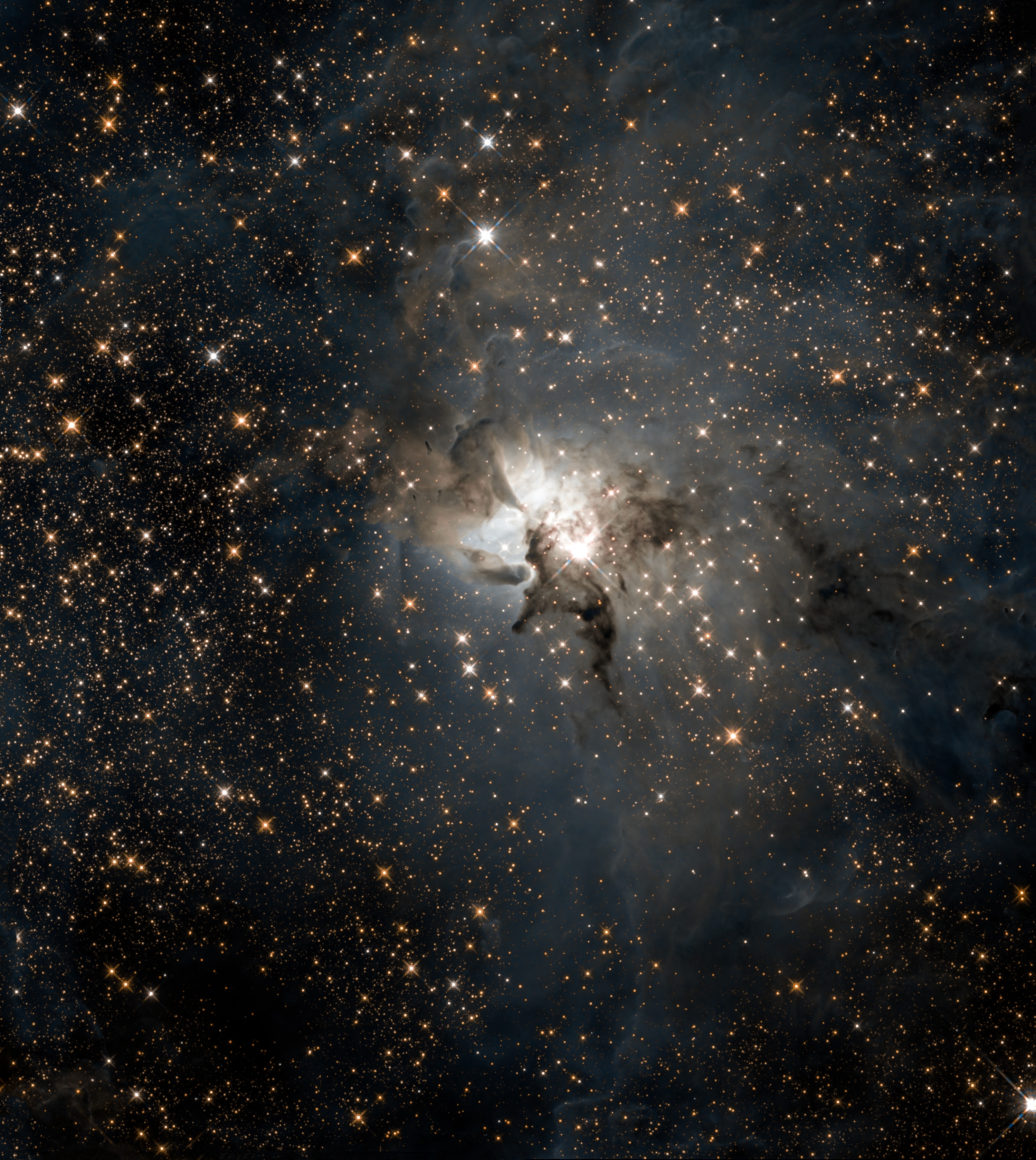 Stars fill this infrared view, spanning 4 light-years across the center of the Lagoon Nebula. Visible light images show the glowing gas and obscuring dust clouds that dominate the scene. But this infrared image, constructed from Hubble Space Telescope data, peers closer to the heart of the active star-forming region revealing newborn stars scattered within, against a crowded field of background stars toward the center of our Milky Way galaxy. This tumultuous stellar nursery's central regions are sculpted and energized by the massive, young Herschel 36, seen as the bright star near center in the field of view. Herschel 36 is actually a multiple system of massive stars. At over 30 times the mass of the Sun and less than 1 million years old, the most massive star in the system should live to a stellar old age of 5 million years. Compare that to the almost 5 billion year old Sun which will evolve into a red giant in only another 5 billion years or so. The Lagoon Nebula, also known as M8, lies about 4,000 light-years away within the boundaries of the constellation Sagittarius.