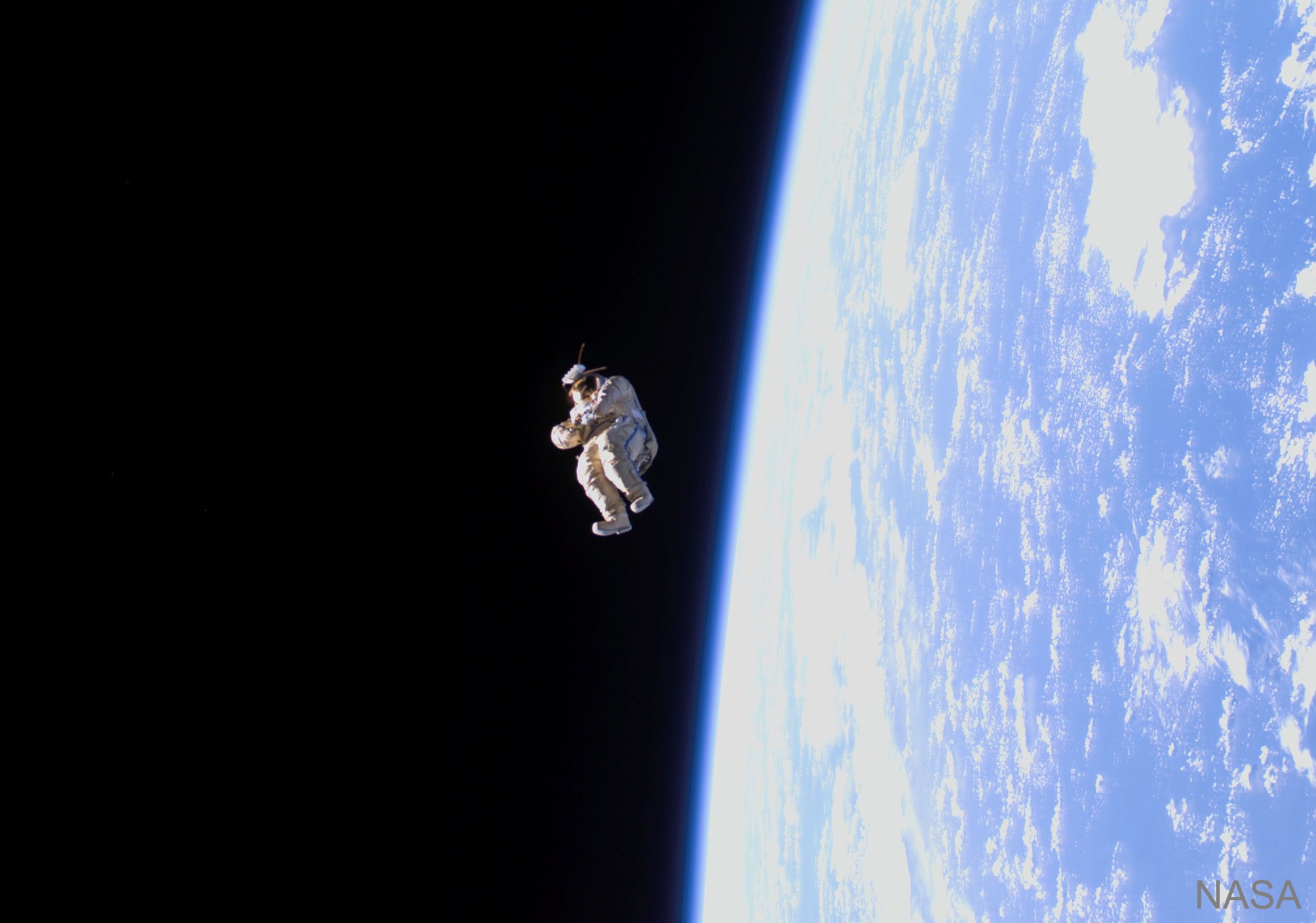 A spacesuit floated away from the International Space Station 15 years ago, but no investigation was conducted.  Everyone knew that it was pushed by the space station crew.   Dubbed Suitsat-1, the unneeded Russian Orlan spacesuit filled mostly with old clothes was fitted with a faint radio transmitter and released to orbit the Earth. The suit circled the Earth twice before its radio signal became unexpectedly weak. Suitsat-1 continued to orbit every 90 minutes until it burned up in the Earth's atmosphere after a few weeks.  Pictured, the lifeless spacesuit was photographed in 2006 just as it drifted away from  space station.    Portal Universe: Random APOD Generator