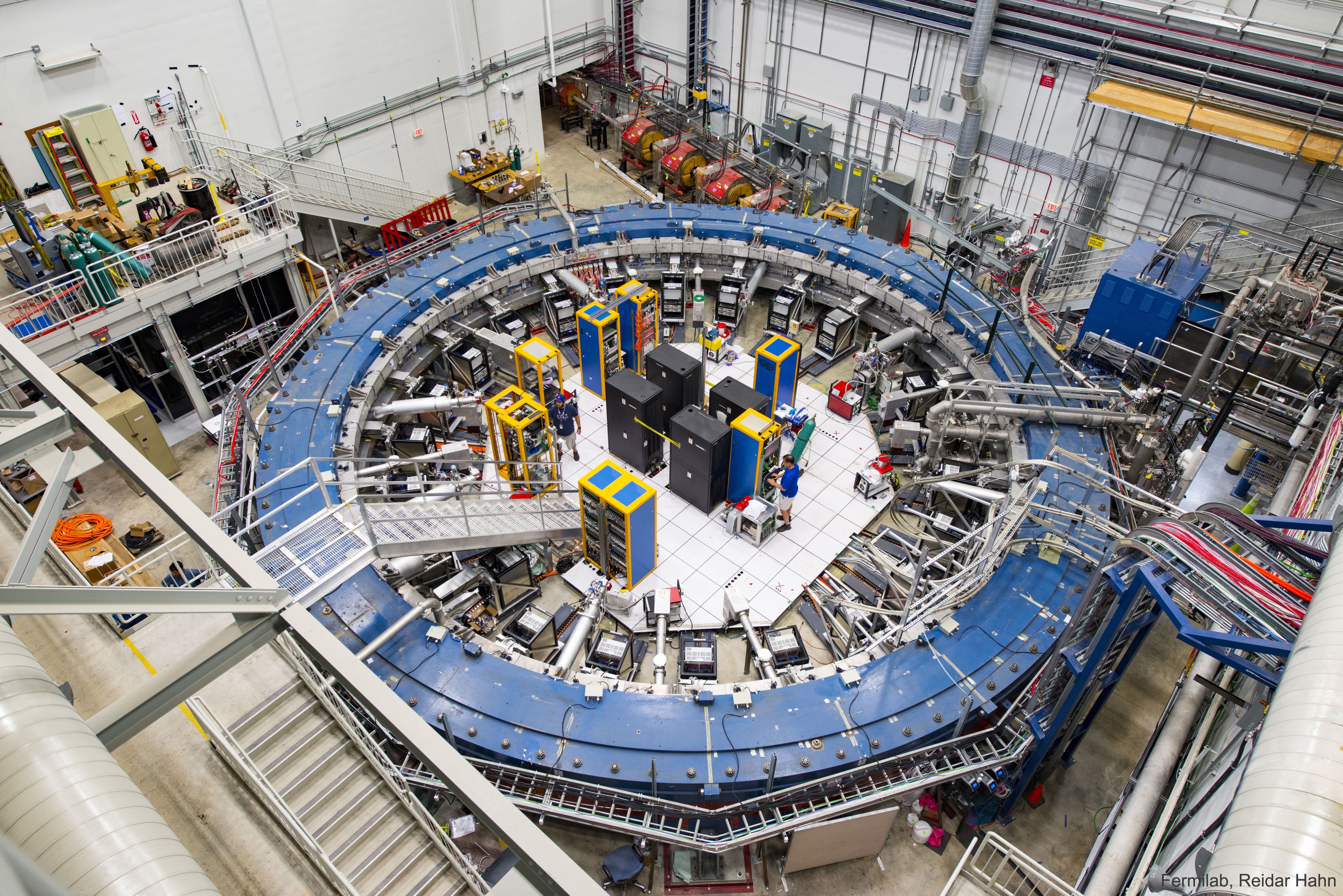 How fast do elementary particles wobble?  A surprising answer to this seemingly inconsequential question came out of Brookhaven National Laboratory in New York, USA in 2001, and indicated that the Standard Model of Particle Physics, adopted widely in physics, is incomplete. Specifically, the muon, a particle with similarities to a heavy electron, has had its relatively large wobble under scrutiny in a series of experiments known as g-2 (gee-minus-two). The Brookhaven result galvanized other experimental groups around the world to confirm it, and pressured theorists to better understand it.  Reporting in last week, the most sensitive muon wobble experiment yet, conducted at Fermi National Accelerator Laboratory (Fermilab) in Illinois and pictured here, agreed with the Brookhaven result. The unexpected wobble rate may indicate that an ever-present sea of  virtual particles includes types not currently known.  Alternatively, it may indicate that flaws exist in difficult theoretical prediction calculations. Future runs at Fermilab's g-2 experiment will further increase precision and, possibly, the statistical difference between the universe we measure and the universe we understand.