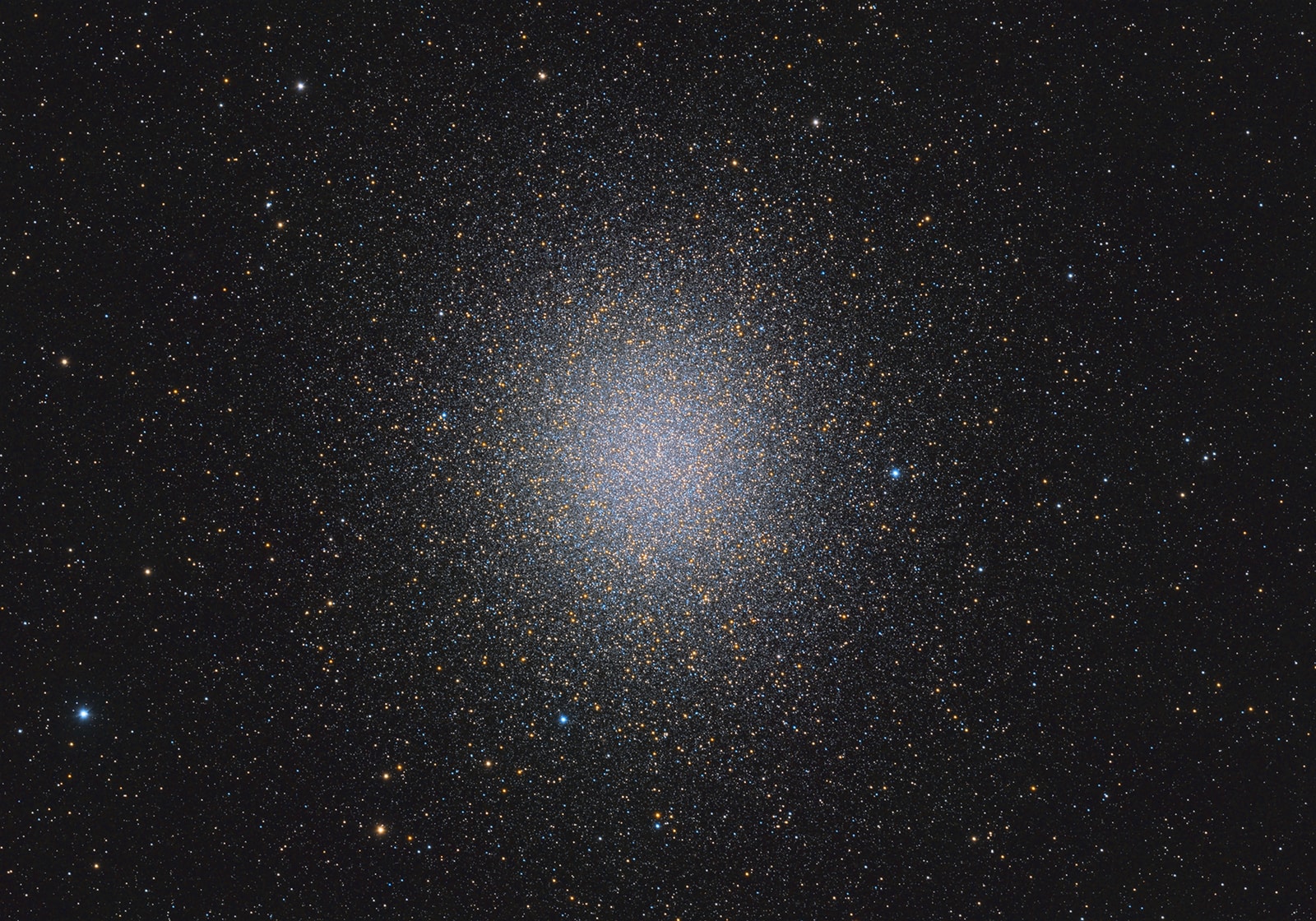 Globular star cluster Omega Centauri, also known as NGC 5139, is some 15,000 light-years away. The cluster is packed with about 10 million stars much older than the Sun within a volume about 150 light-years in diameter. It's the largest and brightest of 200 or so known globular clusters that roam the halo of our Milky Way galaxy. Though most star clusters consist of stars with the same age and composition, the enigmatic Omega Cen exhibits the presence of different stellar populations with a spread of ages and chemical abundances. In fact, Omega Cen may be the remnant core of a small galaxy merging with the Milky Way. Omega Centauri's red giant stars (with a yellowish hue) are easy to pick out in this sharp, color telescopic view.