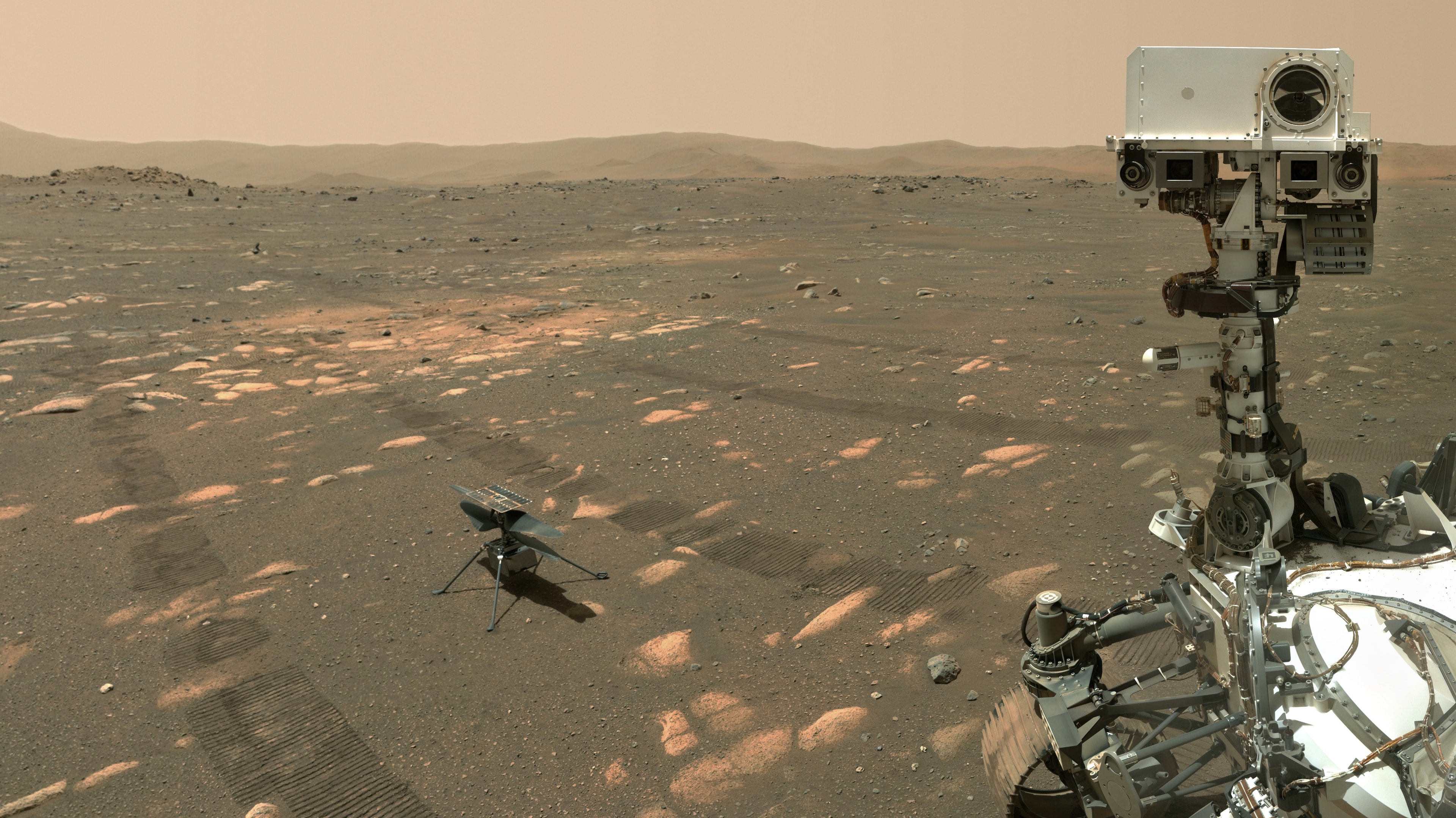 On sol 46 (April 6, 2021) the Perseverance rover held out a robotic arm to take its first selfie on Mars. The WATSON camera at the end of the arm was designed to take close-ups of martian rocks and surface details though, and not a quick snap shot of friends and smiling faces. In the end, teamwork and weeks of planning on Mars time was required to program a complex series of exposures and camera motions to include Perseverance and its surroundings. The resulting 62 frames were composed into a detailed mosiac, one of the most complicated Mars rover selfies ever taken. In this version of the selfie, the rover's Mastcam-Z and SuperCam instruments are looking toward WATSON and the end of the rover's outstretched arm. About 4 meters (13 feet) from Perseverance is a robotic companion, the Mars Ingenuity helicopter.