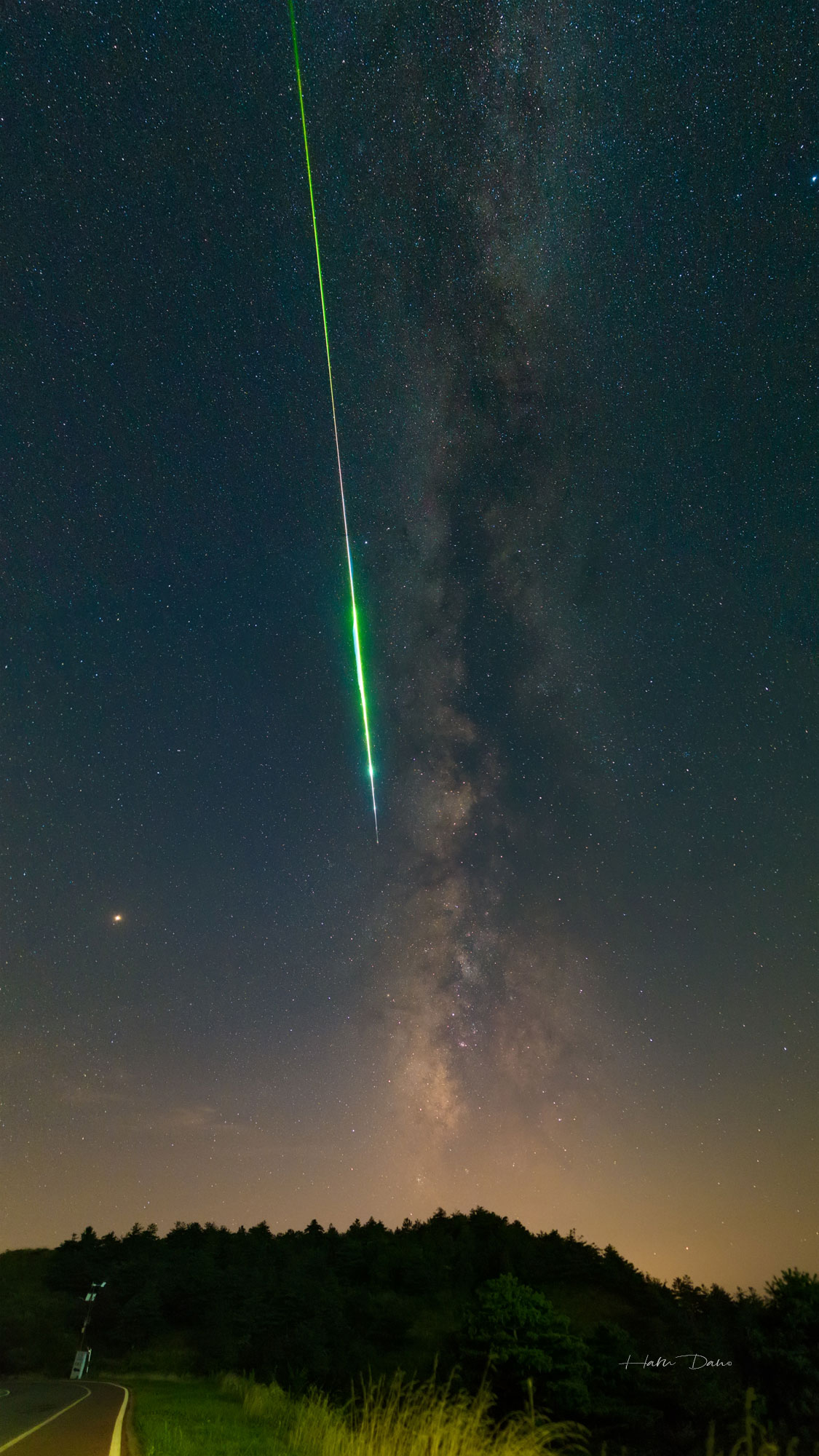 It was bright and green and flashed as it moved quickly along the Milky Way. It left a trail that took 30 minutes to dissipate.  Given the day, August 12, and the direction, away from Perseus, it was likely a small bit from the nucleus of Comet Swift-Tuttle plowing through the Earth's atmosphere -- and therefore part of the annual Perseids meteor shower.  The astrophotographer captured the fireball as it shot across the sky in 2018 above a valley in Yichang, Hubei, China. The meteor's streak, also caught on video, ended near the direction of Mars on the lower left. Next week, the 2021 Perseids meteor shower will peak again.  This year the Moon will set shortly after the Sun, leaving a night sky ideal for seeing lots of Perseids from dark and clear locations across planet Earth.   Follow APOD in English on: Facebook,  Instagram, or Twitter