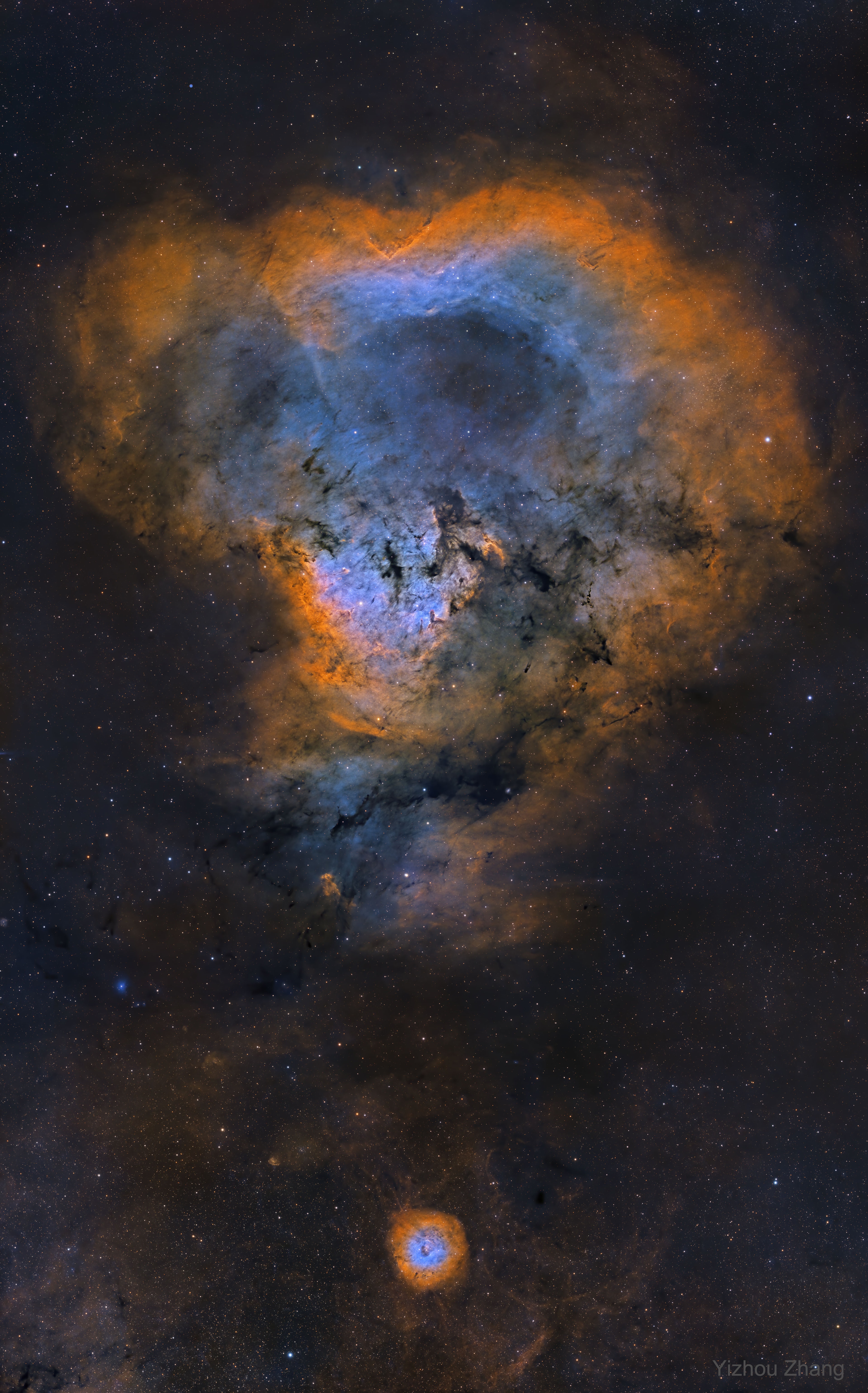 It may look like a huge cosmic question mark, but the big question really is  how does the bright gas and dark dust tell this nebula's history of star formation.  At the edge of a giant molecular cloud toward the northern constellation Cepheus, the glowing star forming region NGC 7822 lies about 3,000 light-years away. Within the nebula, bright edges and dark shapes stand out in this colorful and detailed skyscape. The 9-panel mosaic, taken over 28 nights with a small telescope in Texas, includes data from narrowband filters, mapping emission from atomic oxygen, hydrogen, and sulfur into blue, green, and red hues. The emission line and color combination has become well-known as the Hubble palette. The atomic emission is powered by energetic radiation from the central hot stars. Their powerful winds and radiation sculpt and erode the denser pillar shapes and clear out a characteristic cavity light-years across the center of the natal cloud. Stars could still be forming inside the pillars by gravitational collapse but as the pillars are eroded away, any forming stars will ultimately be cut off from their reservoir of star stuff. This field of view spans over 40 light-years across at the estimated distance of NGC 7822.