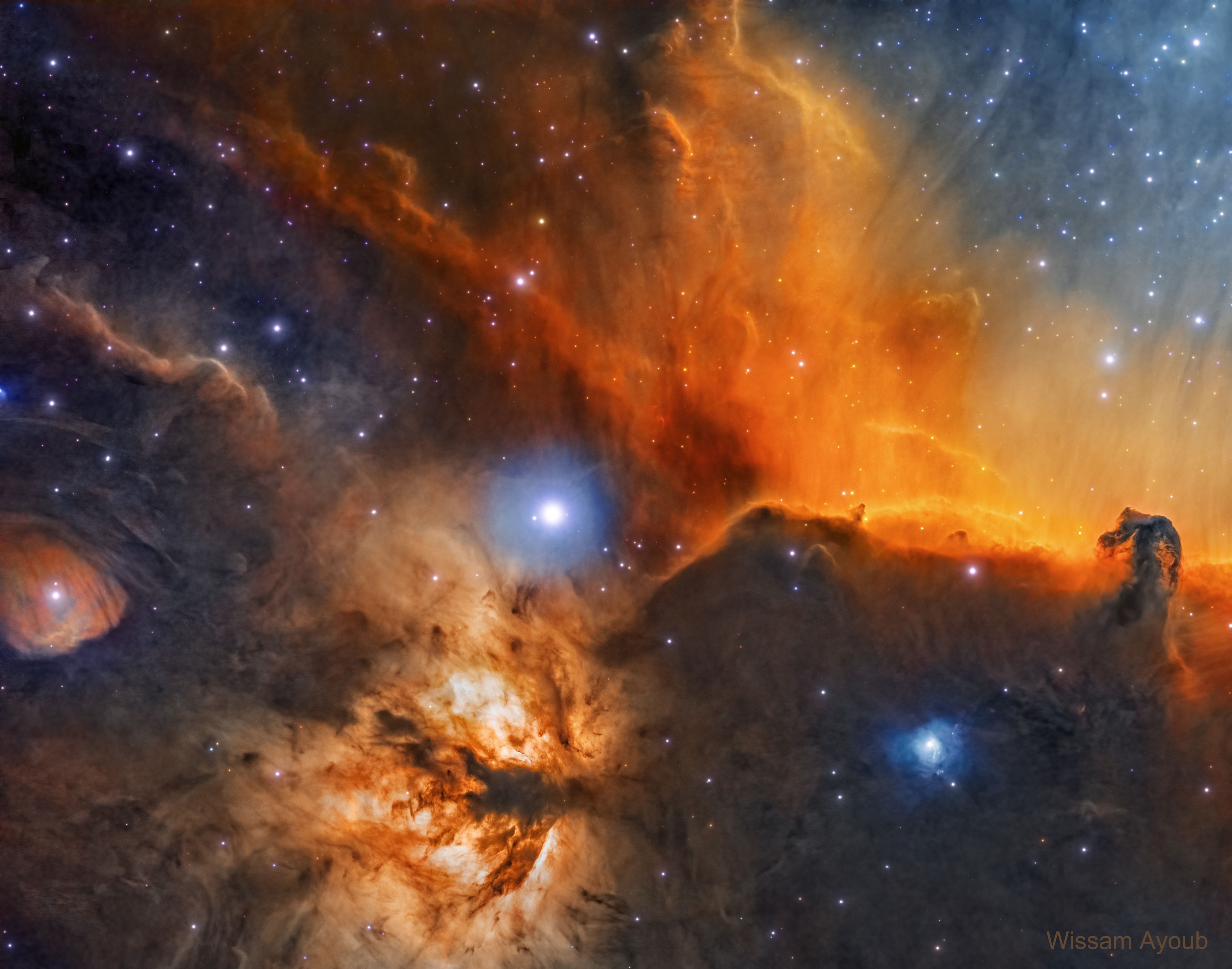 The Horsehead Nebula is one of the most famous nebulae on the sky.  It is visible as the dark indentation to the orange emission nebula at the far right of the featured picture.  The horse-head feature is dark because it is really an opaque dust cloud that lies in front of the bright emission nebula. Like clouds in Earth's atmosphere, this cosmic cloud has assumed a recognizable shape by chance.  After many thousands of years, the internal motions of the cloud will surely alter its appearance.  The emission nebula's orange color is caused by electrons recombining with protons to form hydrogen atoms.  Toward the lower left of the image is the Flame Nebula, an orange-tinged nebula that also contains intricate filaments of dark dust. Two prominent reflection nebulas are visible: round IC 432 on the far left, and blue NGC 2023 just to the lower left of the Horsehead nebula.  Each glows primarily by reflecting the light of their central star.   Discovery + Outreach: Graduate student research position open for APOD