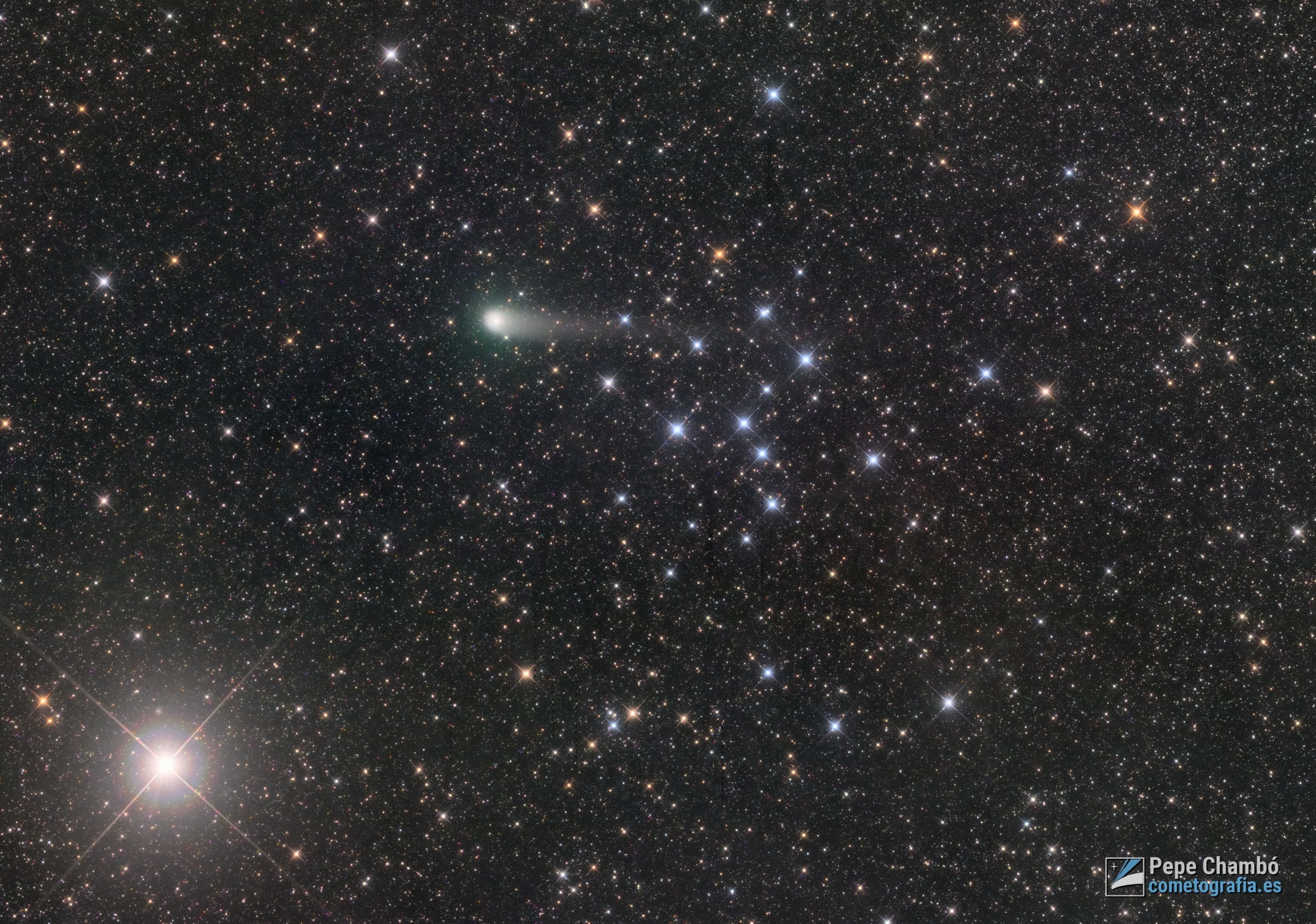 Imaged on June 20 2022, comet C/2017 K2 (PanSTARRS) shares this wide telescopic field of view with open star cluster IC 4665 and bright star Beta Ophiuchi, near a starry edge of the Milky Way. On its maiden voyage to the inner Solar System from the dim and distant Oort cloud, this comet PanSTARRS was initially spotted over five years ago, in May 2017. Then it was the most distant active inbound comet ever found, discovered when it was some 2.4 billion kilometers from the Sun. That put it between the orbital distances of Uranus and Saturn. Hubble Space Telescope observations indicated the comet had a large nucleus less than 18 kilometers in diameter.  Now visible in small telescopes C/2017 K2 will make its closest approach to planet Earth on July 14 and closest approach to the Sun this December. Its extended coma and developing tail are seen here at a distance of some 290 million kilometers, a mere 16 light-minutes away.