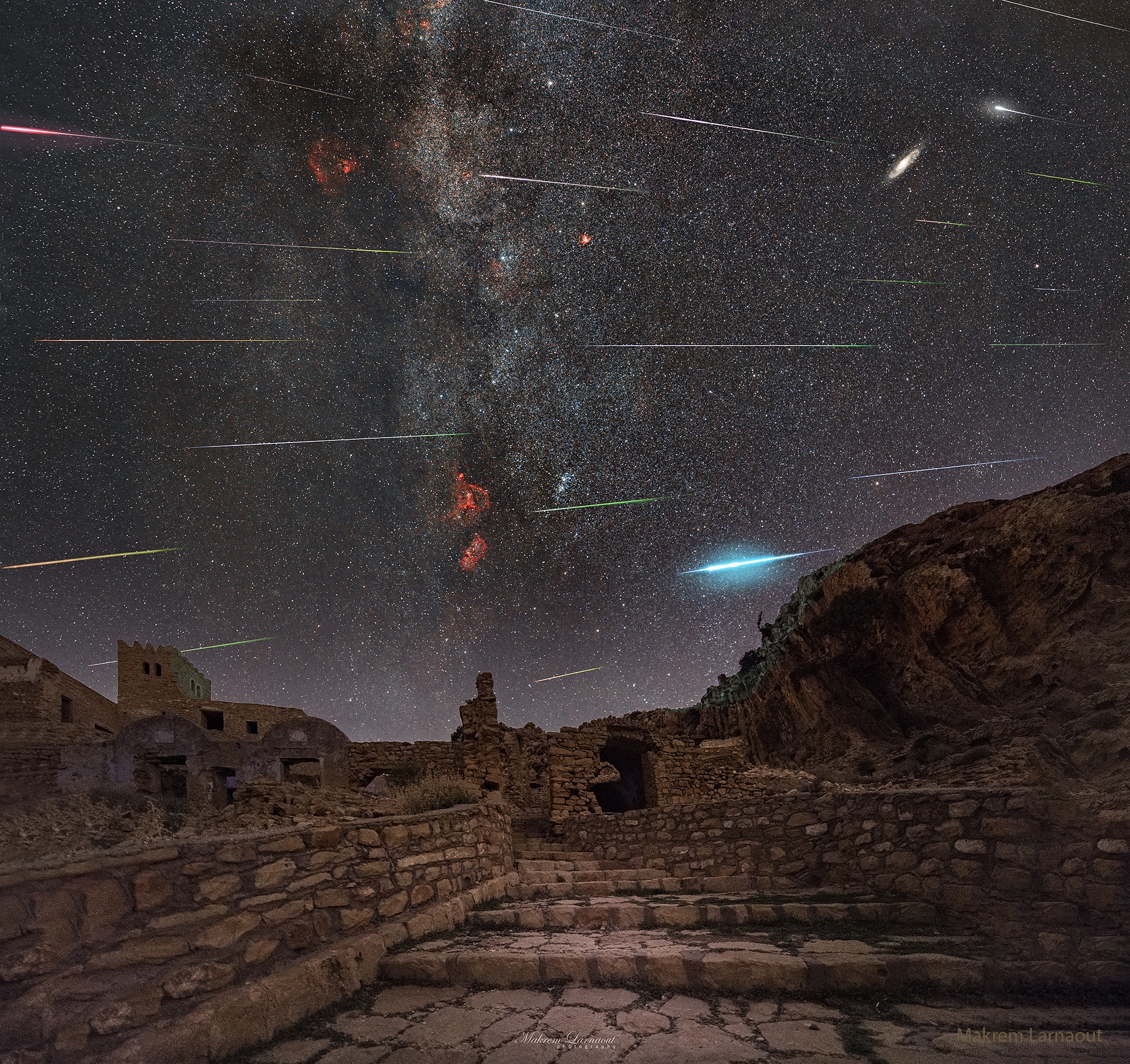 Does the Earth ever pass through a wind of meteors? Yes, and they are frequently visible as meteor showers. Almost all meteors are sand-sized debris that escaped from a Sun-orbiting comet or asteroid, debris that continues in an elongated orbit around the Sun. Circling the same Sun, our Earth can move through an orbiting debris stream, where it can appear, over time, as a meteor wind. The meteors that light up in Earth's atmosphere, however, are usually destroyed. Their streaks, though, can all be traced back to a single point on the sky called the radiant.  The featured image composite was taken over two days in late July near the ancient Berber village Zriba El Alia in Tunisia, during the peak of the Southern Delta Aquariids meteor shower. The radiant is to the right of the image. A few days ago our Earth experienced the peak of a more famous meteor wind -- the Perseids.