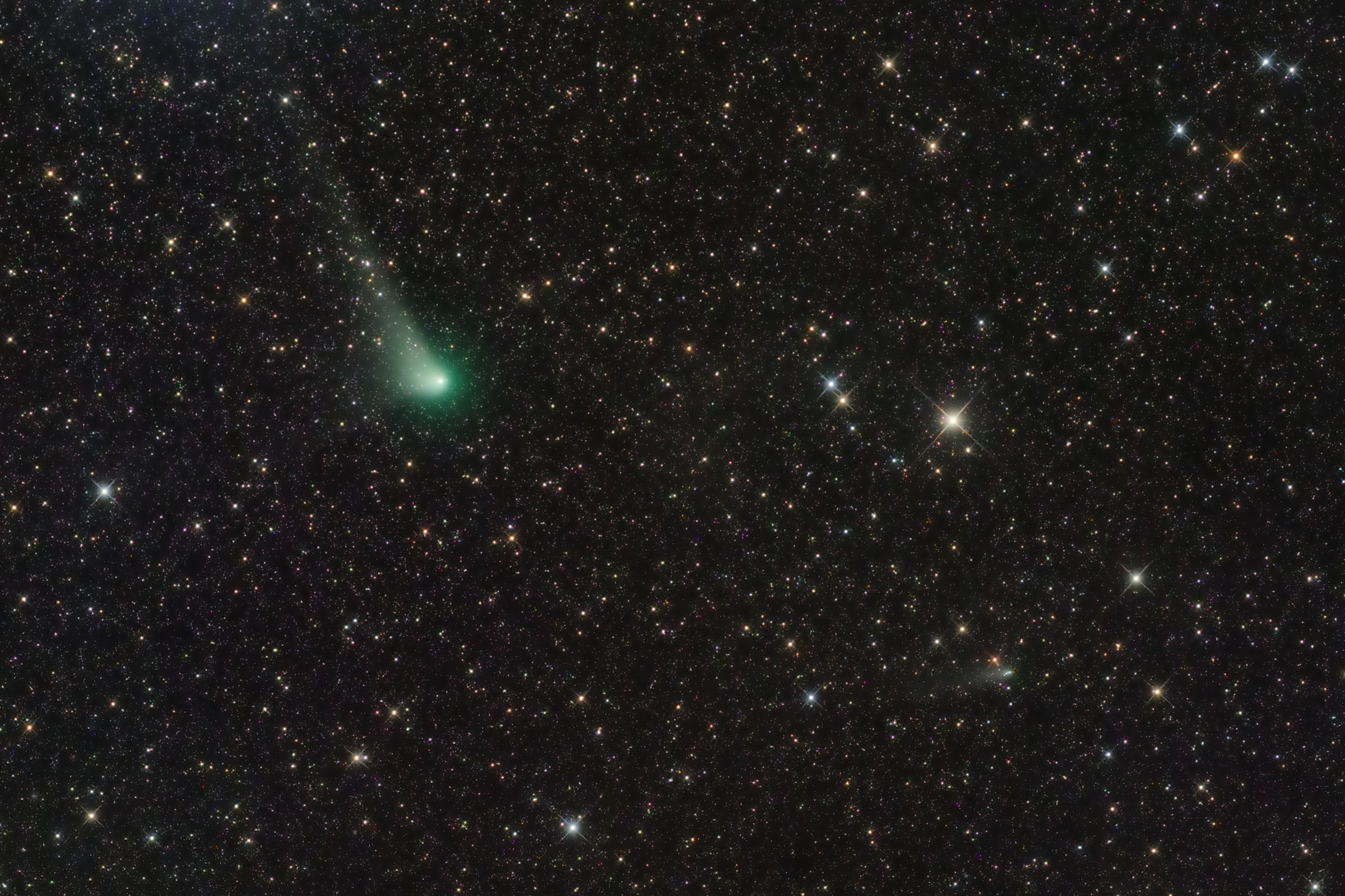 Heading for its closest approach to the Sun or perihelion on December 20, comet C/2017 K2 (PanSTARRS) remains a sight for telescopic observers as it sweeps through planet Earth's southern hemisphere skies.  First time visitor from the remote Oort cloud this comet PanSTARRS sports a greenish coma and whitish dust tail about half a degree long at the upper left in a deep image from September 21. It also shares the starry field of view toward the constellation Scorpius with another comet, 73P/Schwassmann-Wachmann 3, seen about 1 degree below and right of PanSTARRS. Astronomers estimate that first time visitor comet C/2017 K2 (PanSTARRS) has been inbound from the Oort cloud for some 3 million years along a hyperbolic orbit. Schwassmann-Wachmann 3 is more familiar though.  The periodic comet loops through its own elliptical orbit, from just beyond the orbit of Jupiter to the vicinity of Earth's orbit, once every 5.4 years. Just passing in the night, this comet PanSTARRS is about 20 light-minutes from Earth in the September 21 image. Seen to be disintegrating since 1995, Schwassmann-Wachmann 3 was about 7.8 light-minutes away.