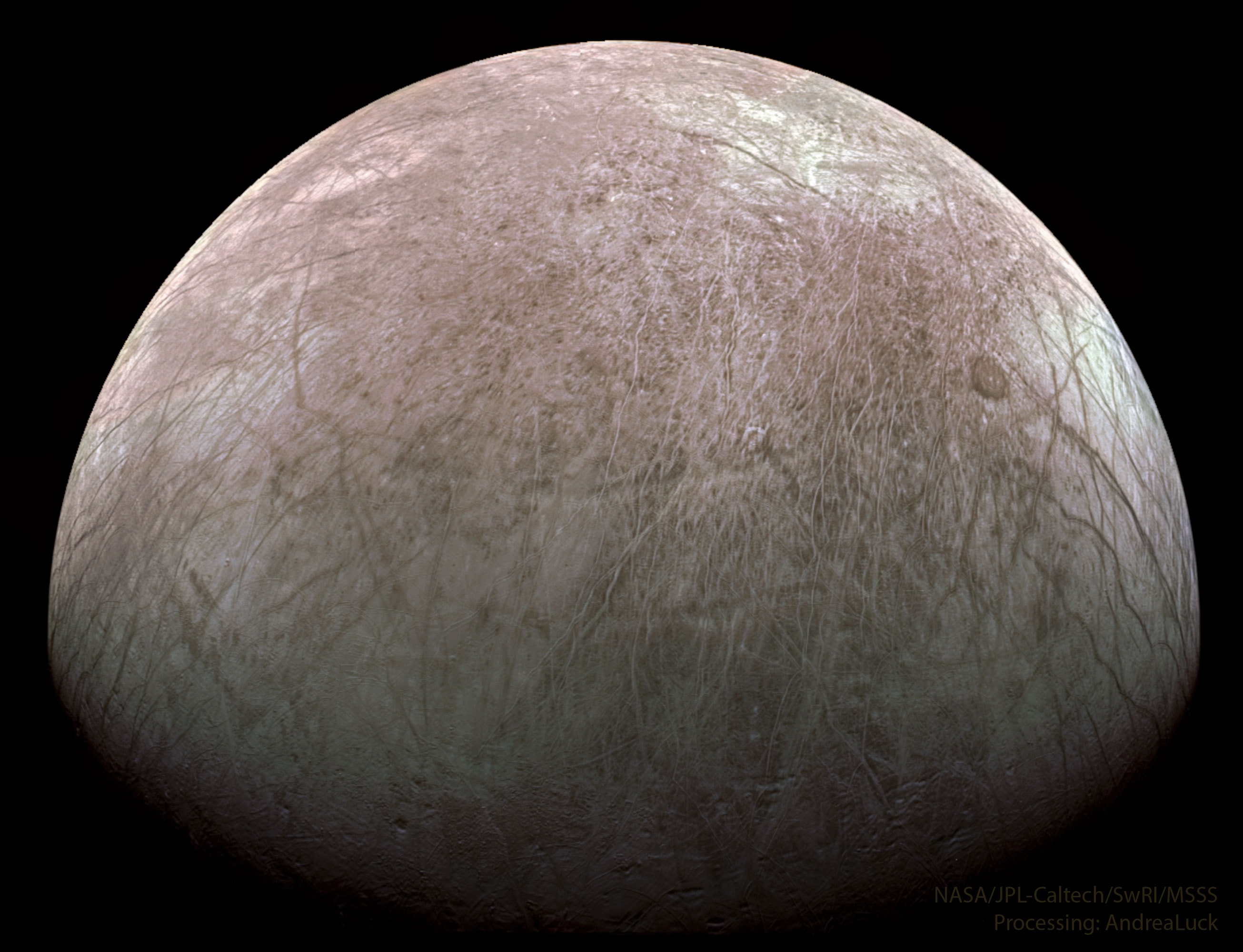 What mysteries might be solved by peering into this crystal ball?  In this case, the ball is actually a moon of Jupiter, the crystals are ice, and the moon is not only dirty but cracked beyond repair.  Nevertheless, speculation is rampant that oceans exist under Europa's fractured ice-plains that could support life.  Europa, roughly the size of Earth's Moon, is pictured here in an image taken a few days ago when the Jupiter-orbiting robotic spacecraft Juno passed within 325 kilometers of its streaked and shifting surface. Underground oceans are thought likely because Europa undergoes global flexing due to its changing gravitational attraction with Jupiter during its slightly elliptical orbit, and this flexing heats the interior. Studying Juno's close-up images may further humanity's understanding not only of Europa and the early Solar System but also of the possibility that life exists elsewhere in the universe.