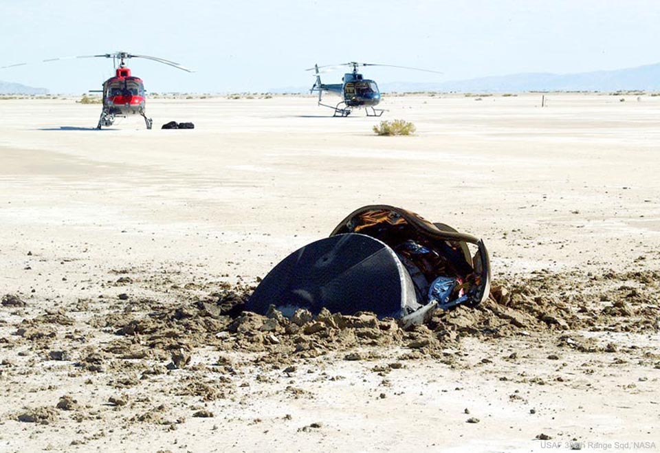 A flying saucer from outer space crash-landed in the Utah desert after being tracked by radar and chased by helicopters.  The year was 2004, and no space aliens were involved.  The saucer, pictured here, was the Genesis sample return capsule, part of a human-made robot Genesis spaceship launched in 2001 by NASA itself to study the Sun.  The unexpectedly hard landing at over 300 kilometers per hour occurred because the parachutes did not open as planned.  The Genesis mission had been orbiting the Sun collecting solar wind particles that are usually deflected away by Earth's magnetic field. Despite the crash landing, many return samples remained in good enough condition to analyze. So far, Genesis-related discoveries include new details about the composition of the Sun and how the abundance of some types of elements differ across the Solar System. These results have provided intriguing clues into details of how the Sun and planets formed billions of years ago.