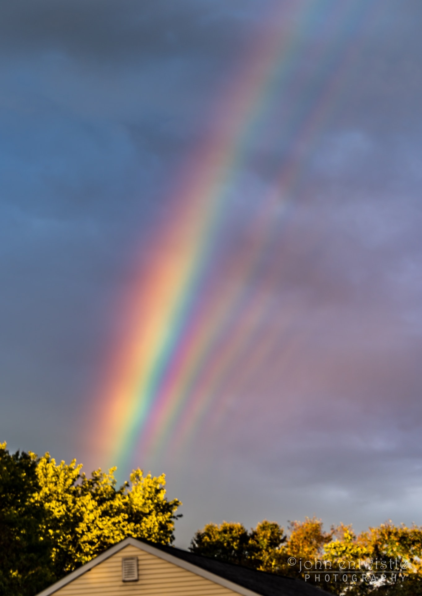 Yes, but can your rainbow do this?  After the remnants of Hurricane Florence passed over the Jersey Shore, New Jersey, USA in 2018, the Sun came out in one direction but something quite unusual appeared in the opposite direction: a hall of rainbows.  Over the course of a next half hour, to the delight of the photographer and his daughter, vibrant supernumerary rainbows faded in and out, with at least five captured in this featured single shot.  Supernumerary rainbows only form when falling water droplets are all nearly the same size and typically less than a millimeter across.  Then, sunlight will not only reflect from inside the raindrops, but interfere, a wave phenomenon similar to ripples on a pond when a stone is thrown in. In fact, supernumerary rainbows can only be explained with waves, and their noted existence in the early 1800s was considered early evidence of light's wave nature.   Your Sky Surprise: What picture did APOD feature on your birthday? (post 1995)