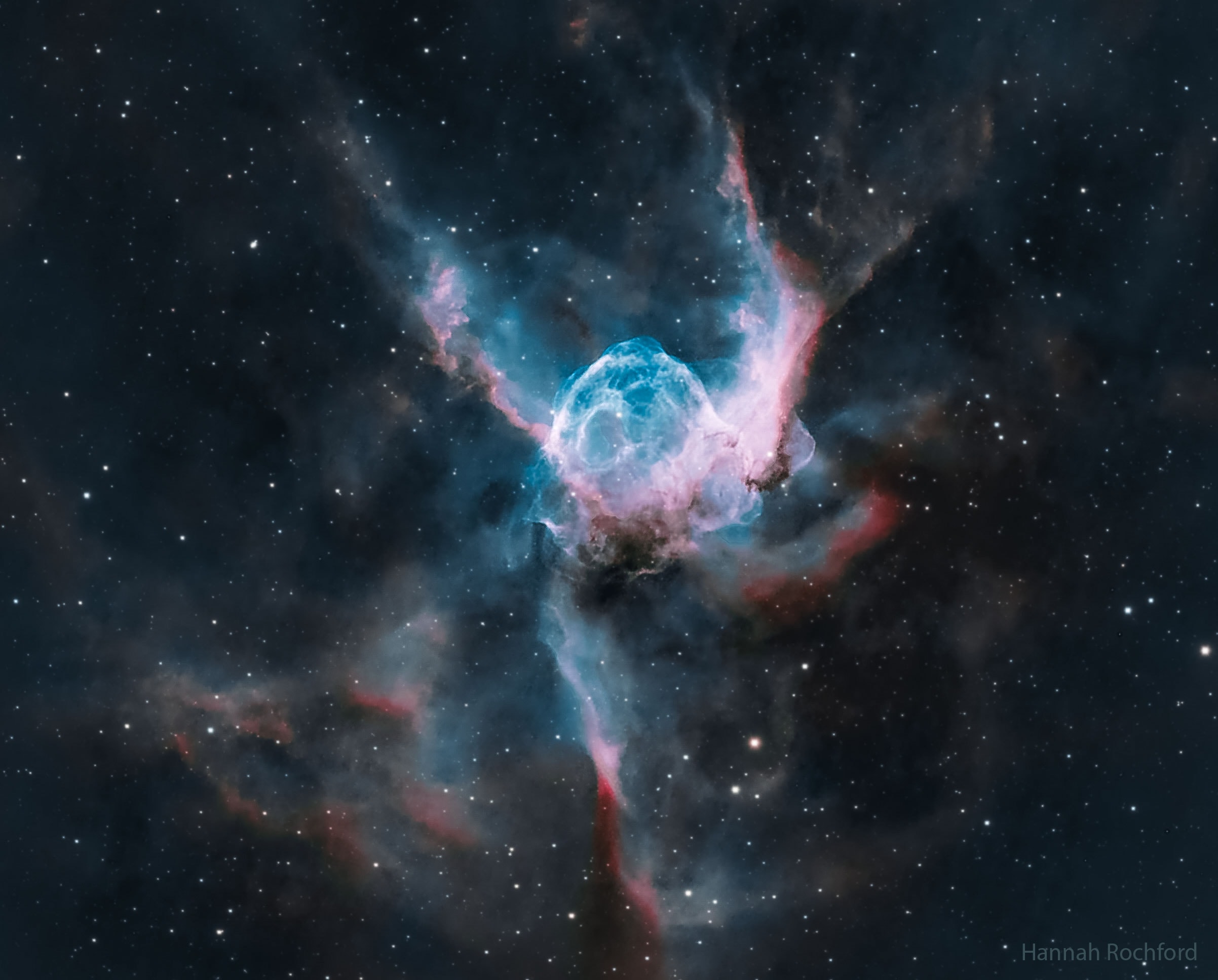 Thor not only has his own day (Thursday), but a helmet in the heavens.  Popularly called Thor's Helmet, NGC 2359 is a hat-shaped cosmic cloud with wing-like appendages. Heroically sized even for a Norse god, Thor's Helmet is about 30 light-years across. In fact, the cosmic head-covering is more like an interstellar bubble, blown with a fast wind from the bright, massive star near the bubble's center. Known as a Wolf-Rayet star, the central star is an extremely hot giant thought to be in a brief, pre-supernova stage of evolution. NGC 2359 is located about 15,000 light-years away toward the constellation of the Great Overdog. This remarkably sharp image is a mixed cocktail of data from  narrowband filters, capturing not only natural looking stars but details of the nebula's filamentary structures. The star in the center of Thor's Helmet is expected to explode in a spectacular supernova sometime within the next few thousand years.    Almost Hyperspace: Random APOD Generator