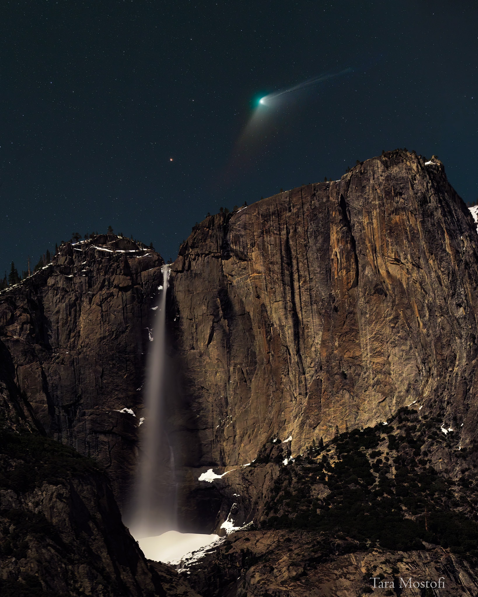 They are both falling. The water in Yosemite Falls, California, USA, is falling toward the Earth. Comet ZTF is falling toward the Sun. This double cosmic cascade was captured late last month as fading Comet C/2022 E3 (ZTF) had just passed its closest to planet Earth. The orange star just over the falls is Kochab. With the exception of a brief encounter with a black bear, the featured image was a well-planned composite of a moonlit-foreground and long-duration background exposures - all designed to reconstruct a deep version of an actual single sight. Although Comet ZTF is now fading as it glides back to the outer Solar System, its path is determined by gravity and so it can be considered to still be falling toward the Sun -- but backwards.    Comet ZTF Gallery: Notable Submissions to APOD