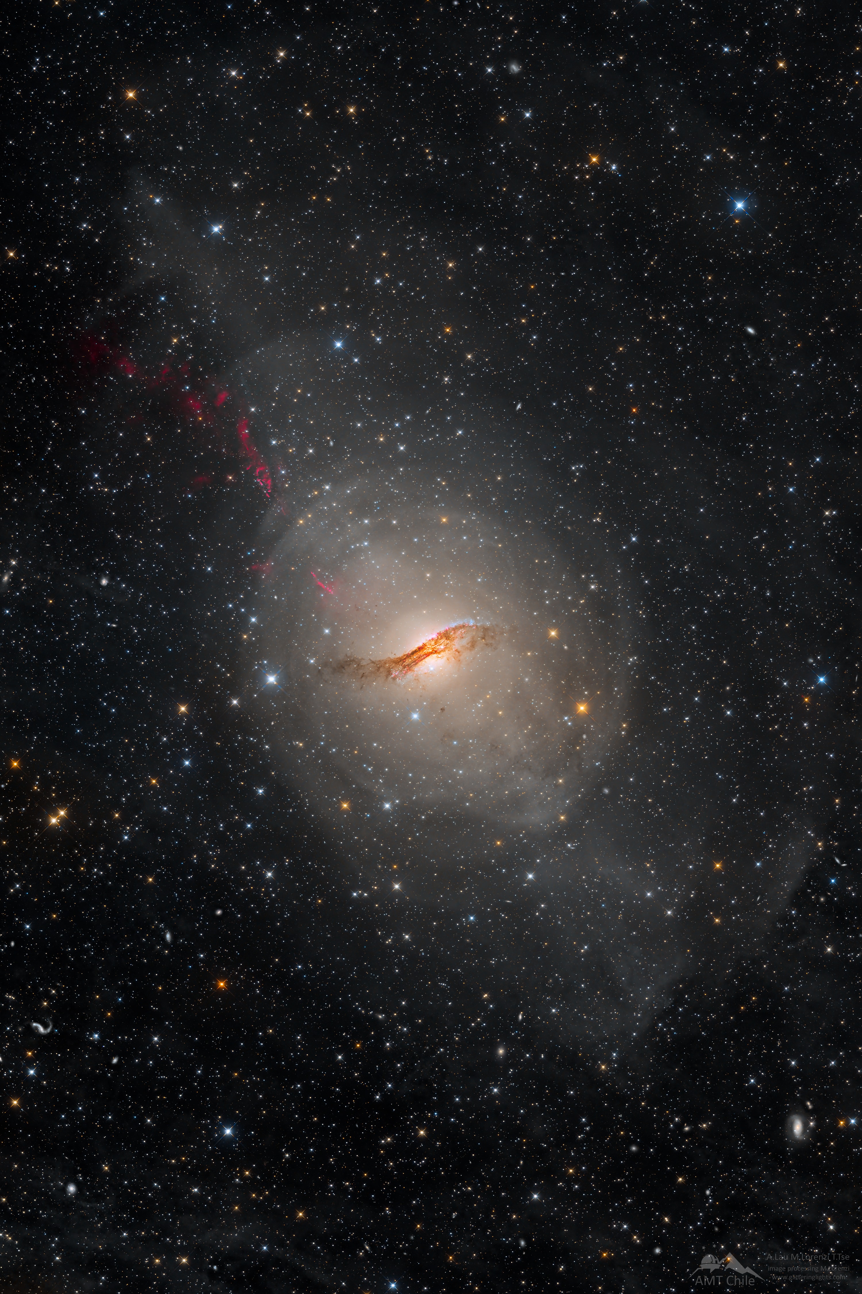 Galaxies are fascinating. In galaxies, gravity alone holds together massive collections of stars, dust, interstellar gas, stellar remnants and dark matter.  Pictured is NGC 5128, better known as Centaurus A.  Cen A is the fifth brightest galaxy on the sky and is located at a distance of about 12 million light years from Earth. The warped shape of Cen A is the result of a merger between an elliptical and a spiral galaxy.  Its active galactic nucleus harbors a supermassive black hole that is about 55 million times more massive than our Sun.  This central black hole ejects a fast  jet visible in both radio and X-ray light. Filaments of the jet are visible in red in the upper left.  New observations by the Event Horizon Telescope have revealed a brightening of the jet only towards its edges -- but for reasons that are currently unknown and an active topic of research.   At NASA it's: Black Hole Week
