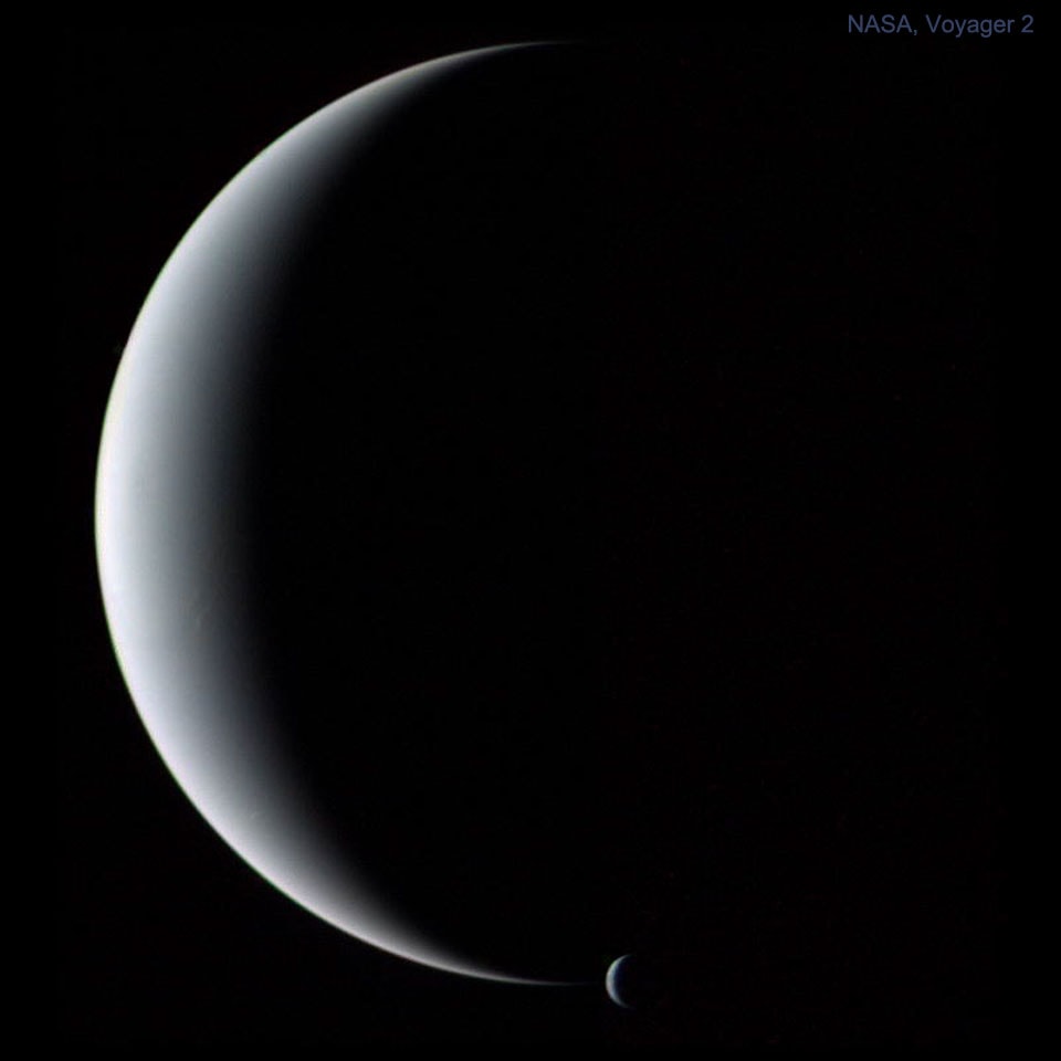 Gliding through the outer Solar System, in 1989 the Voyager 2 spacecraft looked toward the Sun to find this view of most distant planet Neptune and its moon Triton together in a crescent phase.  The elegant image of ice-giant planet and largest moon was taken from behind just after Voyager's closest approach. It could not have been taken from Earth because the most distant planet never shows a crescent phase to sunward eyes. Heading for the heliopause and beyond, the spacecraft's parting vantage point also robs Neptune of its familiar blue hue.