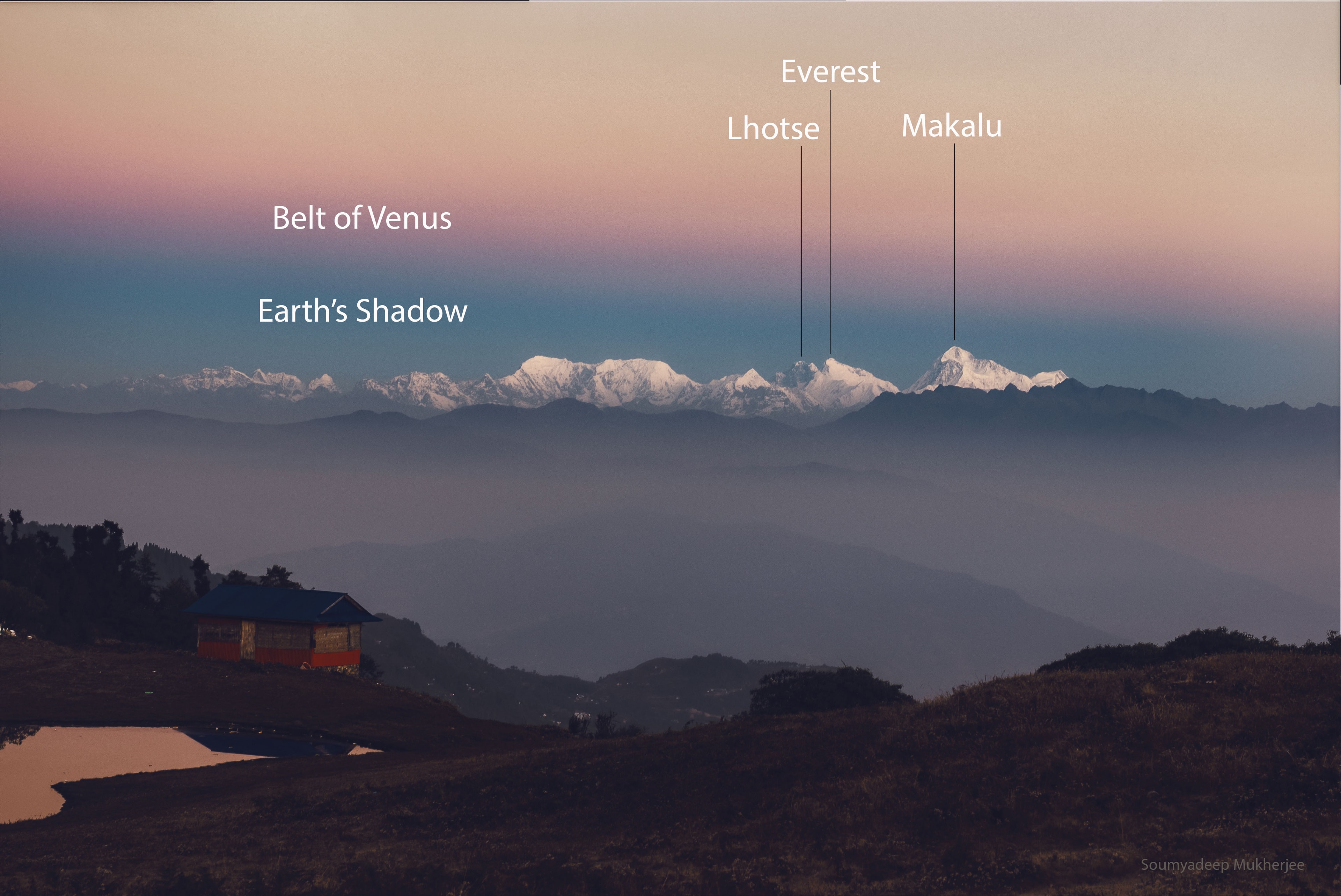 You've surely seen it, but you might not have noticed it.  During a cloudless twilight, just before sunrise or after sunset, part of the atmosphere above the horizon appears slightly dark and off-color.  Called the Belt of Venus, this transitional band between the dark eclipsed sky and the bright day sky can be seen most prominently in the direction opposite the Sun.  Straight above, blue sky is normal sunlight reflecting off the atmosphere, while near the horizon the clear sky can appear more orange or red.  In the Belt of Venus, the atmosphere reflects more light from the setting (or rising) Sun and so appears more red.  Featured here, the Belt of Venus was photographed over several Himalayan mountains including, second from the right, Mount Everest, the tallest mountain on Earth.  Although usually not mentioned, the belt is frequently caught by accident in other photographs.