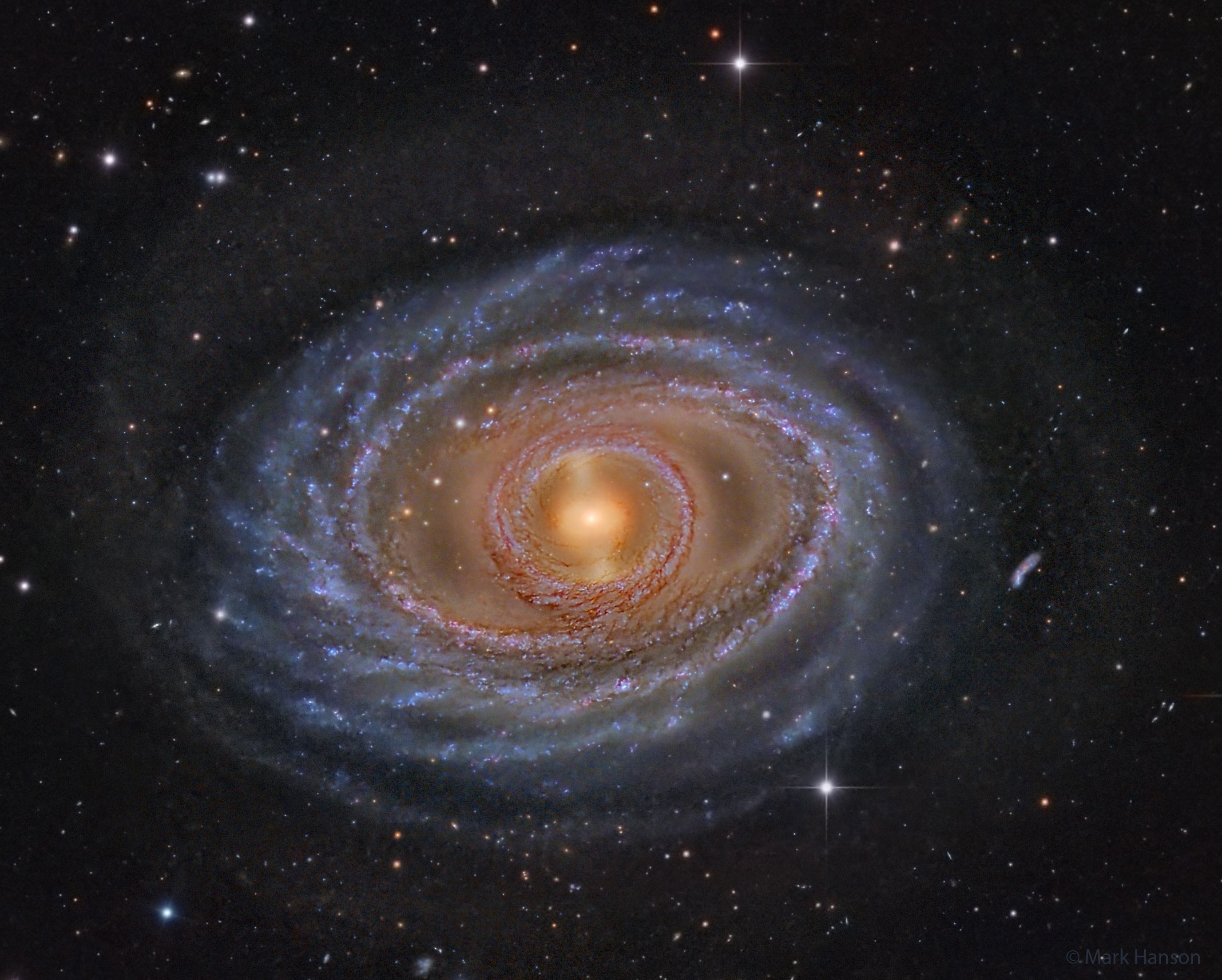 Why do some spiral galaxies have a ring around the center? Spiral galaxy NGC 1398 not only has a ring of pearly stars, gas and dust around its center, but a bar of stars and gas across its center, and spiral arms that appear like ribbons farther out.  The featured deep image from Observatorio El Sauce in Chile shows the grand spiral galaxy in impressive detail. NGC 1398 lies about 65 million light years distant, meaning the light we see today left this galaxy when dinosaurs were disappearing from the Earth.  The photogenic galaxy is visible with a small telescope toward the constellation of the Furnace (Fornax). The ring near the center is likely an expanding density wave of star formation, caused either by a gravitational encounter with another galaxy, or by the galaxy's own gravitational asymmetries.