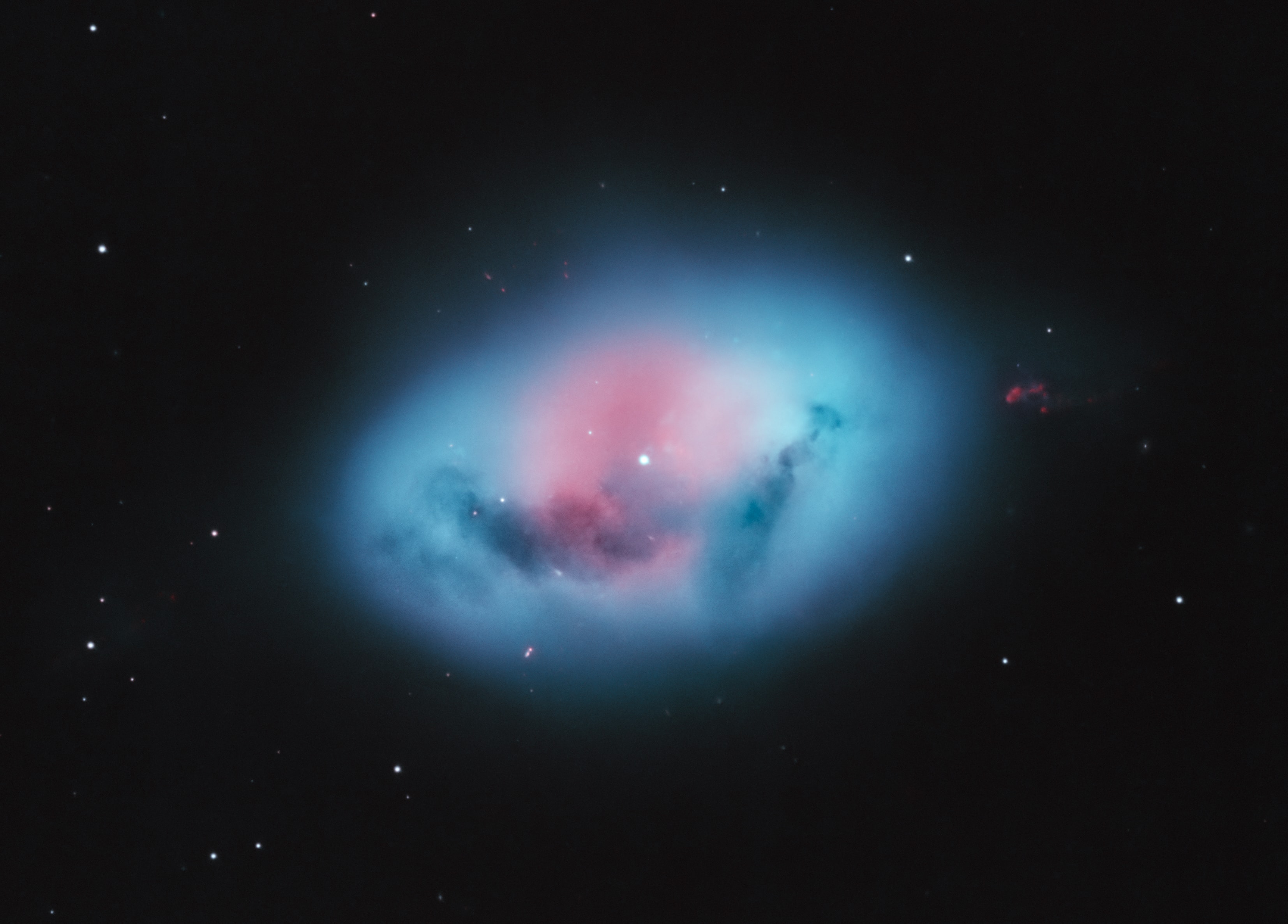 This pretty nebula lies some 1,500 light-years away, its shape and color in this telescopic view reminiscent of a robin's egg. The cosmic cloud spans about 3 light-years, nestled securely within the boundaries of the southern constellation Fornax. Recognized as a planetary nebula, egg-shaped NGC 1360 doesn't represent a beginning though. Instead it corresponds to a brief and final phase in the evolution of an aging star. In fact, visible at the center of the nebula, the central star of NGC 1360 is known to be a binary star system likely consisting of two evolved white dwarf stars, less massive but much hotter than the Sun.  Their intense and otherwise invisible ultraviolet radiation has stripped away electrons from the atoms in their mutually surrounding gaseous shroud. The predominant blue-green hue of NGC 1360 seen here is the strong emission produced as electrons recombine with doubly ionized oxygen atoms.
