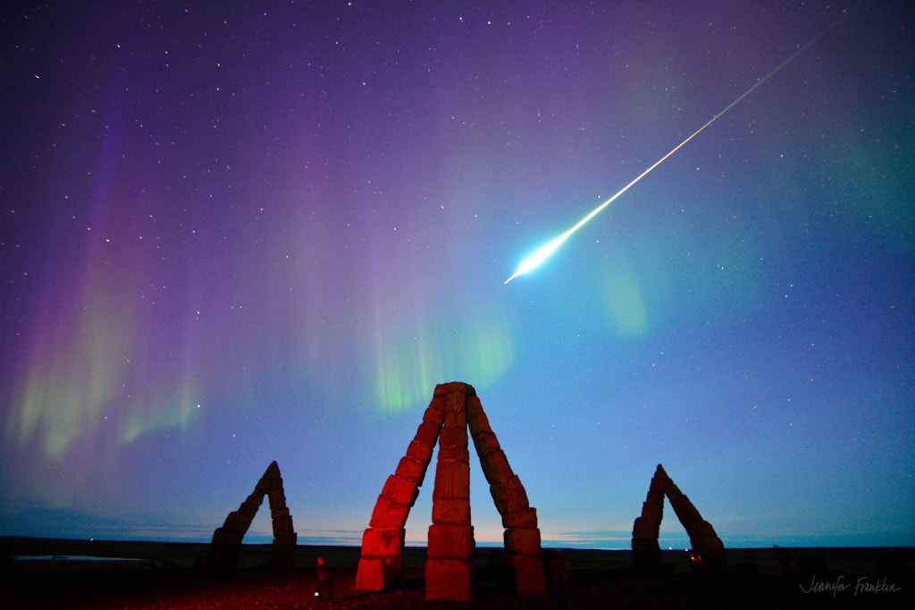 On September 12, from a location just south of the Arctic Circle, stones of Iceland's modern Arctic Henge point skyward in this startling scene. Entertaining an intrepid group of aurora hunters during a geomagnetic storm, alluring northern lights dance across the darkened sky when a stunning fireball meteor explodes. Awestruck, the camera-equipped skygazers captured video and still images of the boreal bolide, at its peak about as bright as a full moon. Though quickly fading from view, the fireball left a lingering visible trail or persistent train. The wraith-like trail was seen for minutes wafting in the upper atmosphere at altitudes of 60 to 90 kilometers along with the auroral glow.