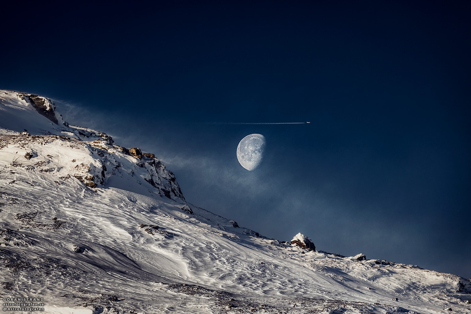 This is a gibbous Moon. More Earthlings are familiar with a full moon, when the entire face of Luna is lit by the Sun, and a crescent moon, when only a sliver of the Moon's face is lit.  When more than half of the Moon is illuminated, though, but still short of full illumination, the phase is called gibbous.  Rarely seen in television and movies, gibbous moons are quite common in the actual night sky. The featured image was taken in Jämtland, Sweden near the end of 2018 October. That gibbous moon turned, in a few days, into a crescent moon, and then a new moon, then back to a crescent, and a few days past that, back to gibbous.  Setting up to capture a picturesque gibbous moonscape, the photographer was quite surprised to find an airplane, surely well in the foreground, appearing to fly past it.   Almost Hyperspace: Random APOD Generator