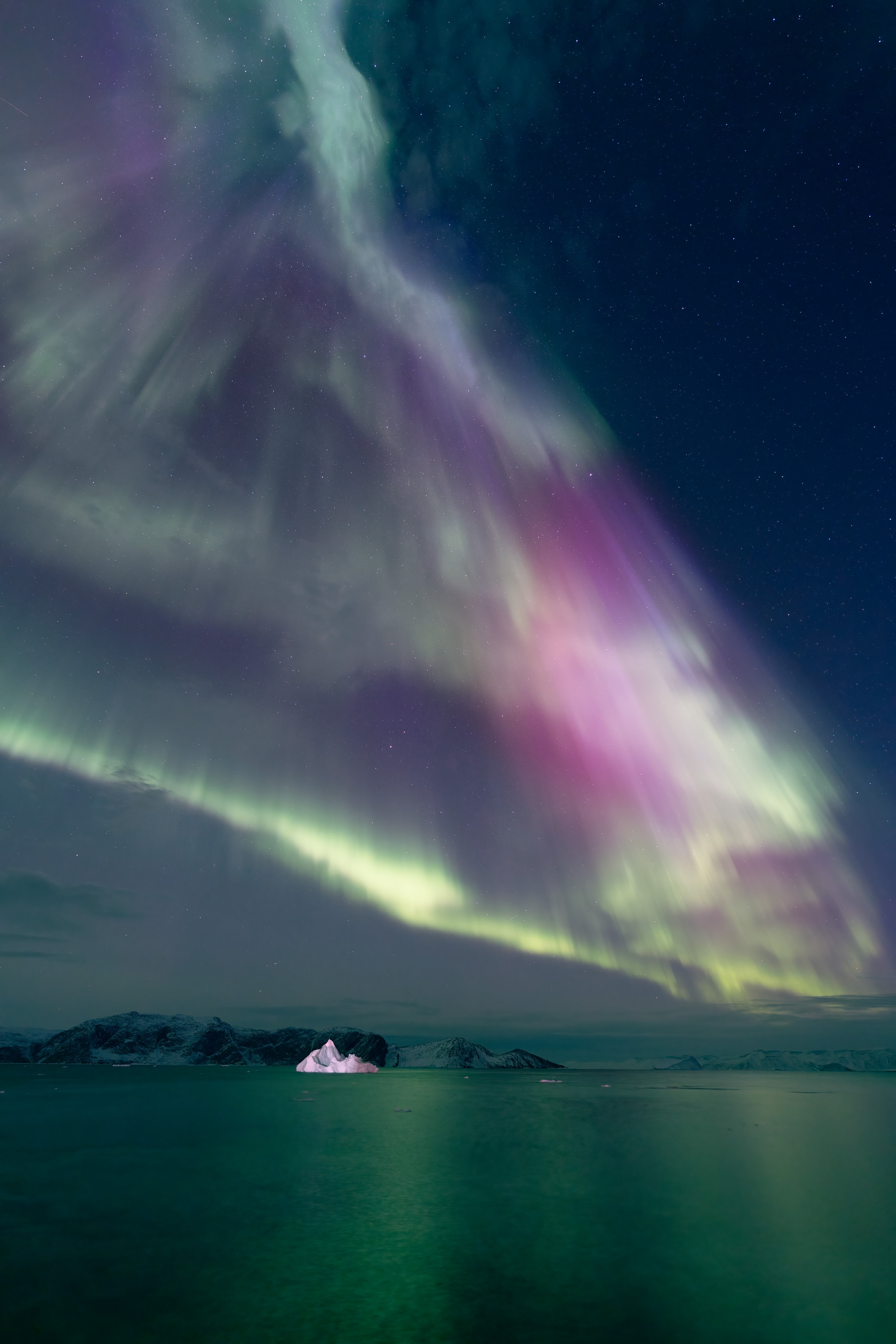 Light pollution is usually not a problem in Qeqertaq. In western Greenland the remote coastal village boasted a population of 114 in 2020. Lights still shine in its dark skies though. During planet Earth's recent intense geomagnetic storm, on November 6 these beautiful curtains of aurora borealis fell over the arctic realm. On the eve of the coming weeks of polar night at 70 degrees north latitude, the inspiring display of northern lights is reflected in the waters of Disko Bay. In this view from the isolated settlement a lone iceberg is illuminated by shore lights as it drifts across the icy sea.  Weekend Watch: The Leonid Meteor Shower.