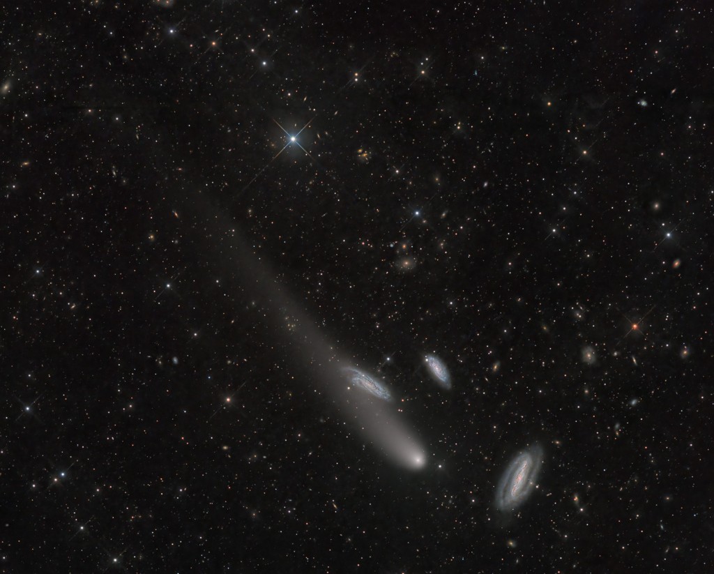 Distant galaxies abound in this one degree wide field of view toward the southern constellation Grus (The Crane). But the three spiral galaxies at the lower right are quite striking. In fact, all three galaxies are grouped about 70 million light years away and sometimes known as the Grus Triplet. They share the pretty telescopic frame, recorded on December 13, with the comet designated C/2020 V2 ZTF. Now outbound from the inner Solar System and swinging below the ecliptic plane in a hyperbolic orbit, the comet was about 29 light-minutes from our fair planet in this image. And though this comet ZTF was brighter when it was closest to the Sun last May and closest to Earth in September of 2023, it still shines in telescopes pointed toward southern night skies, remaining almost as bright as the Grus Triplet galaxies.
