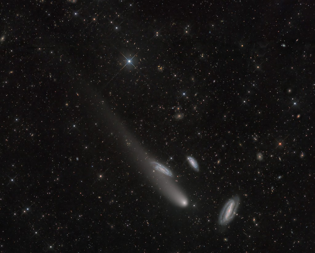 Distant galaxies abound in this one degree wide field of view toward the southern constellation Grus (The Crane). But the three spiral galaxies at the lower right are quite striking. In fact, all three galaxies are grouped about 70 million light years away and sometimes known as the Grus Triplet. They share the pretty telescopic frame, recorded on December 13, with the comet designated C/2020 V2 ZTF. Now outbound from the inner Solar System and swinging below the ecliptic plane in a hyperbolic orbit, the comet was about 29 light-minutes from our fair planet in this image. And though this comet ZTF was brighter when it was closest to the Sun last May and closest to Earth in September of 2023, it still shines in telescopes pointed toward southern night skies, remaining almost as bright as the Grus Triplet galaxies.