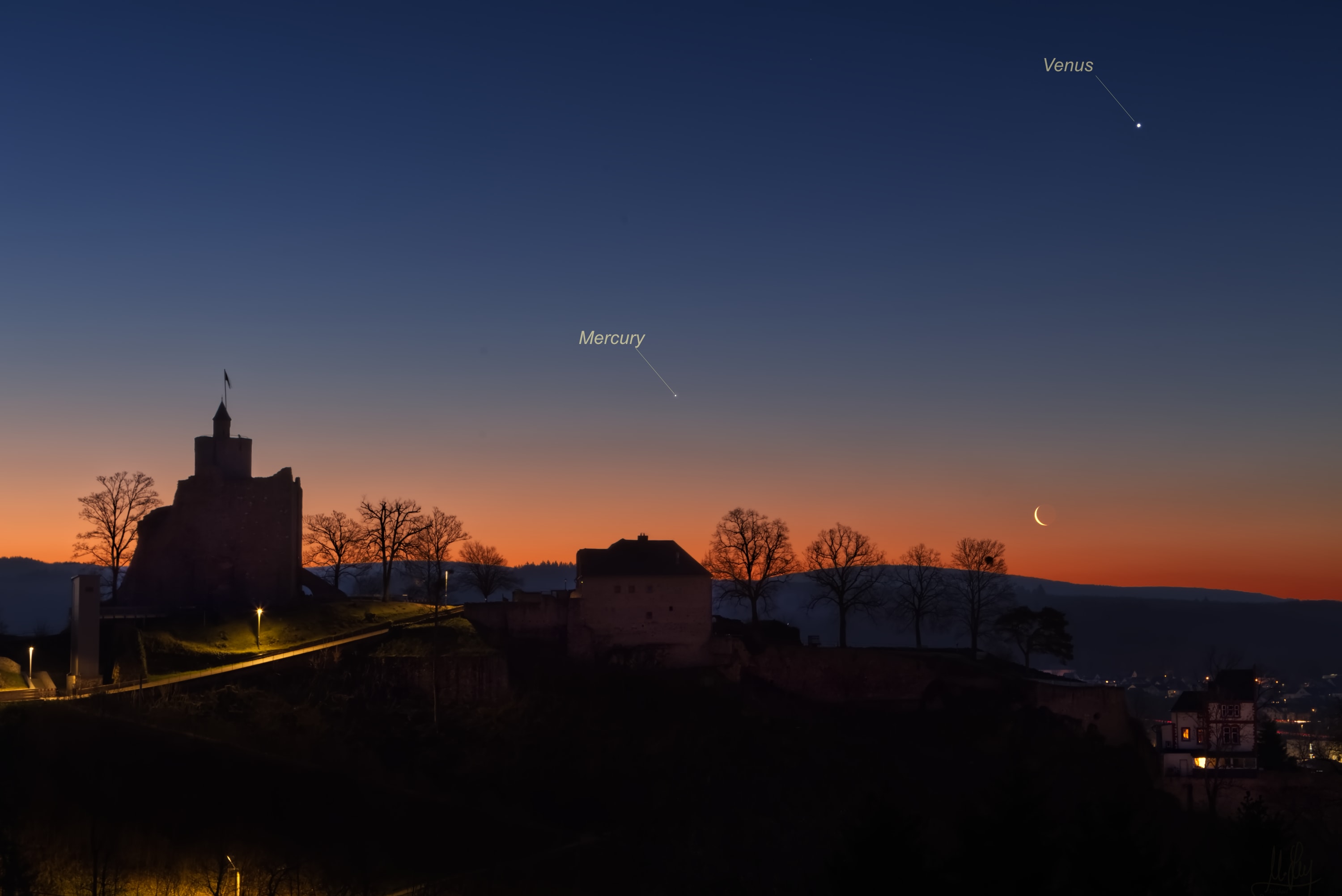 Yesterday, the Moon was New. But on January 9, early morning risers around planet Earth were treated to the sight of an old Moon, low in the east as the sky grew bright before dawn. Above the city of Saarburg in Rhineland-Palatinate, western Germany, this simple snapshot found the waning Moon's sunlit crescent just before sunrise. But also never wandering far from the Sun in Earth's sky, inner planets Venus and Mercury shared the cold morning skyview. In the foreground are the historic city's tower and castle with ruins from the 10th century.