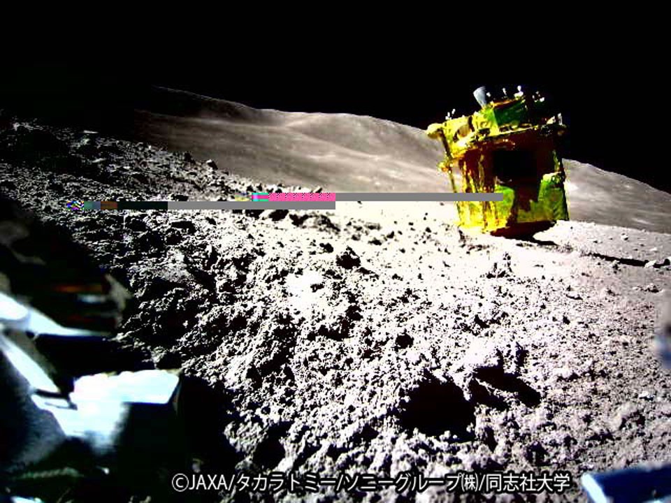 New landers are on the Moon. Nearly two weeks ago, Japan's Smart Lander for Investigating Moon (SLIM) released two rovers as it descended, before its main lander touched down itself. The larger of the two rovers can hop like a frog, while the smaller rover is about the size of a baseball and can move after pulling itself apart like a transformer. The main lander, nicknamed Moon Sniper, is seen in the featured image taken by the smaller rover. Inspection of the image shows that Moon Sniper's thrusters are facing up, meaning that the lander is upside down from its descent configuration and on its side from its intended landing configuration.  One result is that Moon Sniper's solar panels are not in the expected orientation, so that powering the lander had to be curtailed and adapted.  SLIM's lander has already succeeded as a technology demonstration, its main mission, but was not designed to withstand the lunar night -- which starts tomorrow.