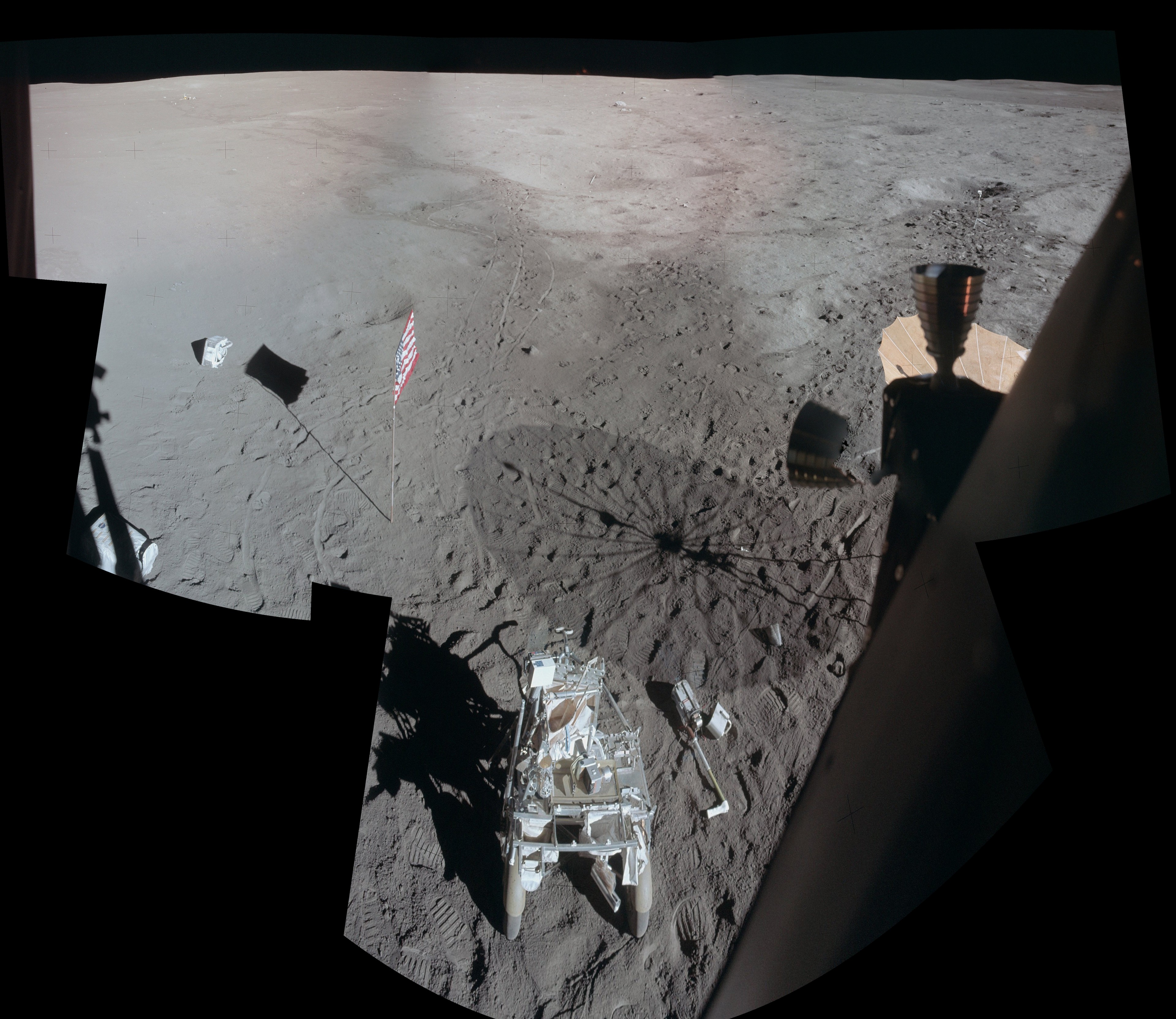 Apollo 14's Lunar Module Antares landed on the Moon on February 5, 1971. Toward the end of the stay astronaut Ed Mitchell snapped a series of photos of the lunar surface while looking out a window, assembled into this detailed mosaic by Apollo Lunar Surface Journal editor Eric Jones. The view looks across the Fra Mauro highlands to the northwest of the landing site after the Apollo 14 astronauts had completed their second and final walk on the Moon. Prominent in the foreground is their Modular Equipment Transporter, a two-wheeled, rickshaw-like device used to carry tools and samples. Near the horizon at top center is a 1.5 meter wide boulder dubbed Turtle rock. In the shallow crater below Turtle rock is the long white handle of a sampling instrument, thrown there javelin-style by Mitchell. Mitchell's fellow moonwalker and first American in space, Alan Shepard, also used a makeshift six iron to hit two golf balls. One of Shepard's golf balls is just visible as a white spot below Mitchell's javelin.