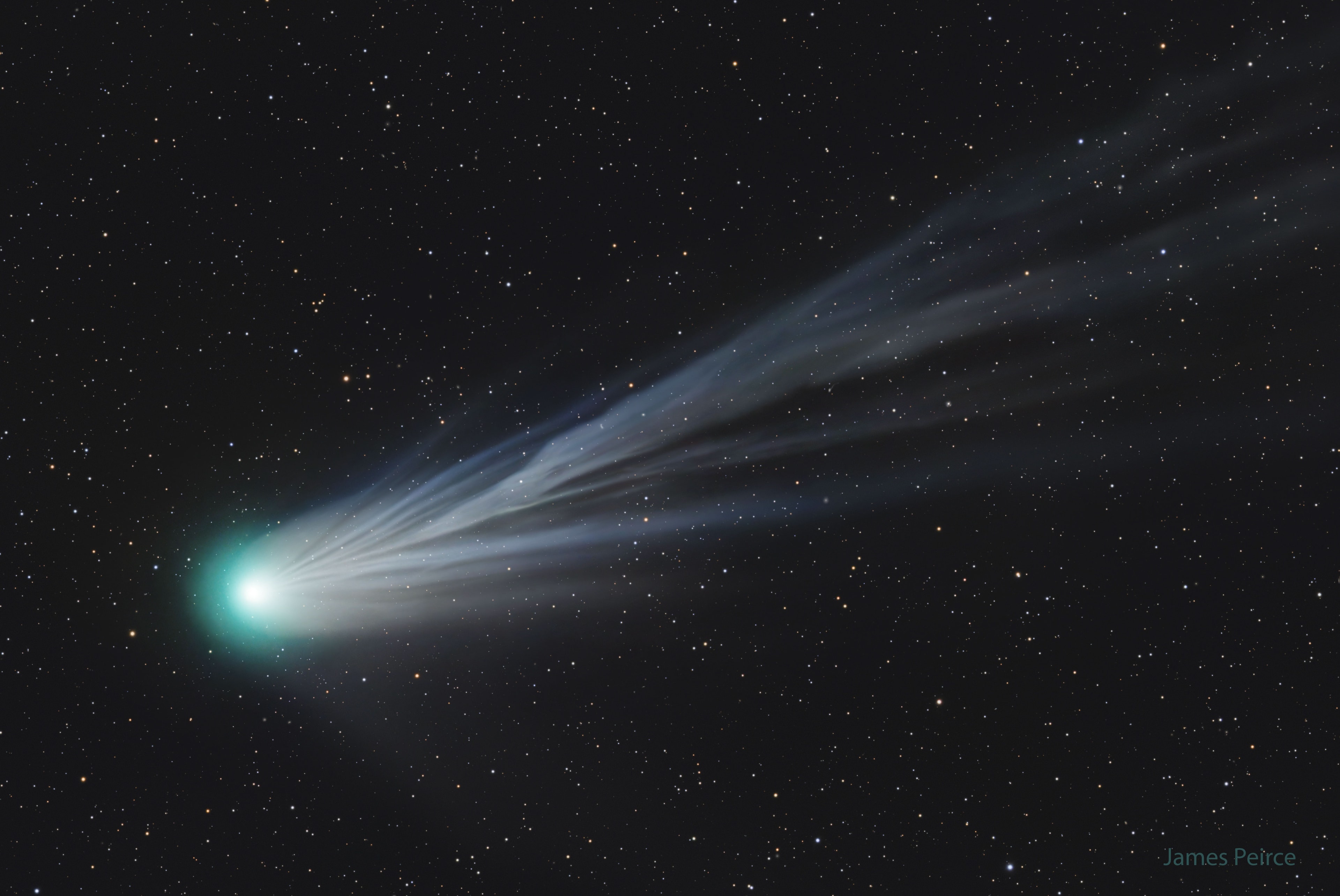 Comet Pons-Brooks has quite a tail to tell.  First discovered in 1385, this erupting dirty snowball loops back into our inner Solar System every 71 years and, this time, is starting to put on a show for deep camera exposures.  In the featured picture, the light blue stream is the ion tail which consists of charged molecules pushed away from the comet's nucleus by the solar wind.  The ion tail, shaped by the Sun's wind and the comet's core's rotation, always points away from the Sun.  Comet 12P/Pons–Brooks is now visible with binoculars in the early evening sky toward the northwest, moving perceptibly from night to night.  The frequently flaring comet is expected to continue to brighten, on the average, and may even become visible with the unaided eye --  during the day -- to those in the path of totality of the coming solar eclipse on April 8.