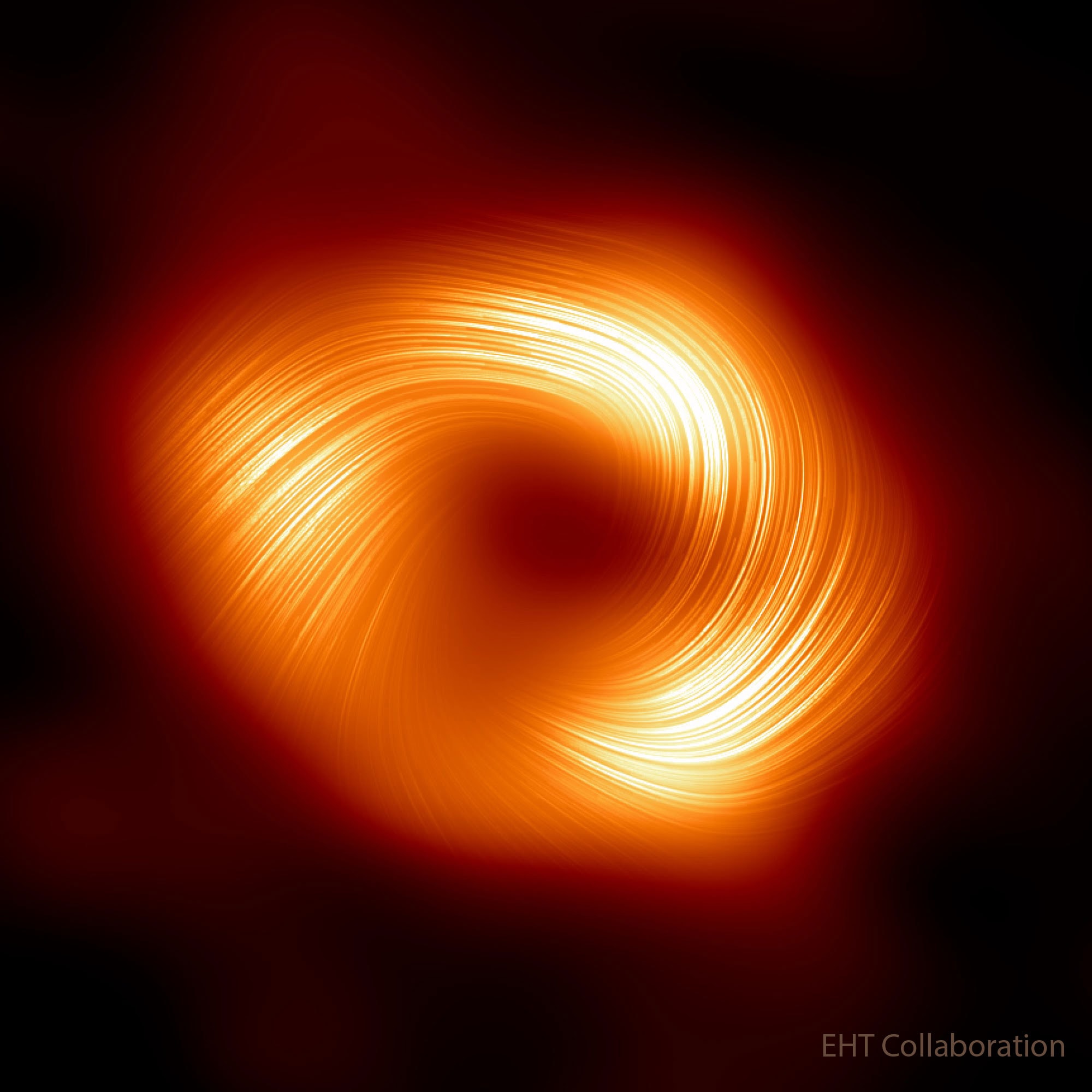 What's happening to the big black hole in the center of our galaxy?  It is sucking in matter from a swirling disk -- a disk that is magnetized, it has now been confirmed. Specifically, the black hole's accretion disk has recently been seen to emit polarized light, radiation frequently associated with a magnetized source. Pictured here is a close-up of Sgr A*, our Galaxy's central black hole, taken by radio telescopes around the world participating in the Event Horizon Telescope (EHT) Collaboration.  Superposed are illustrative curved lines indicating polarized light likely emitted from swirling magnetized gas that will soon fall into the 4+ million solar mass central black hole.  The central part of this image is likely dark because little light-emitting gas is visible between us and the dark event horizon of the black hole.  Continued EHT monitoring of this and M87's central black hole may yield new clues about the gravity of black holes and how infalling matter creates disks and jets.    NASA Predicts:  Moon to Get in Way of Sun