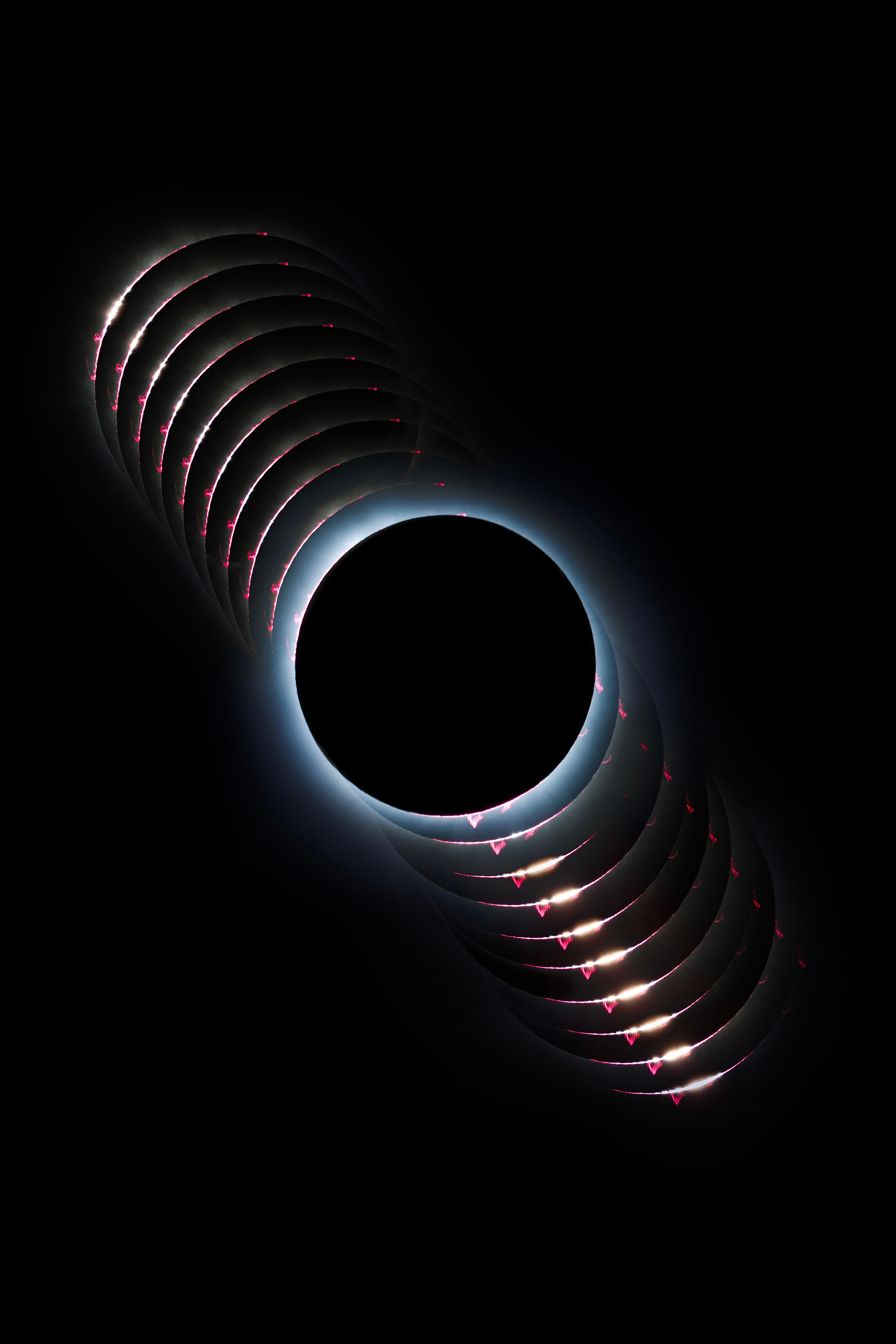 Baily's beads often appear at the boundaries of the total phase of an eclipse of the Sun. Pearls of sunlight still beaming through gaps in the rugged terrain along the lunar limb silhouette, their appearance is recorded in this dramatic timelapse composite. The series of images follows the Moon's edge from beginning through the end of totality during April 8's solar eclipse from Durango, Mexico. They also capture pinkish prominences of plasma arcing high above the edge of the active Sun. One of the first places in North America visited by the Moon's shadow on April 8, totality in Durango lasted about 3 minutes and 46 seconds.   Solar Eclipse Imagery: Notable Submissions to APOD