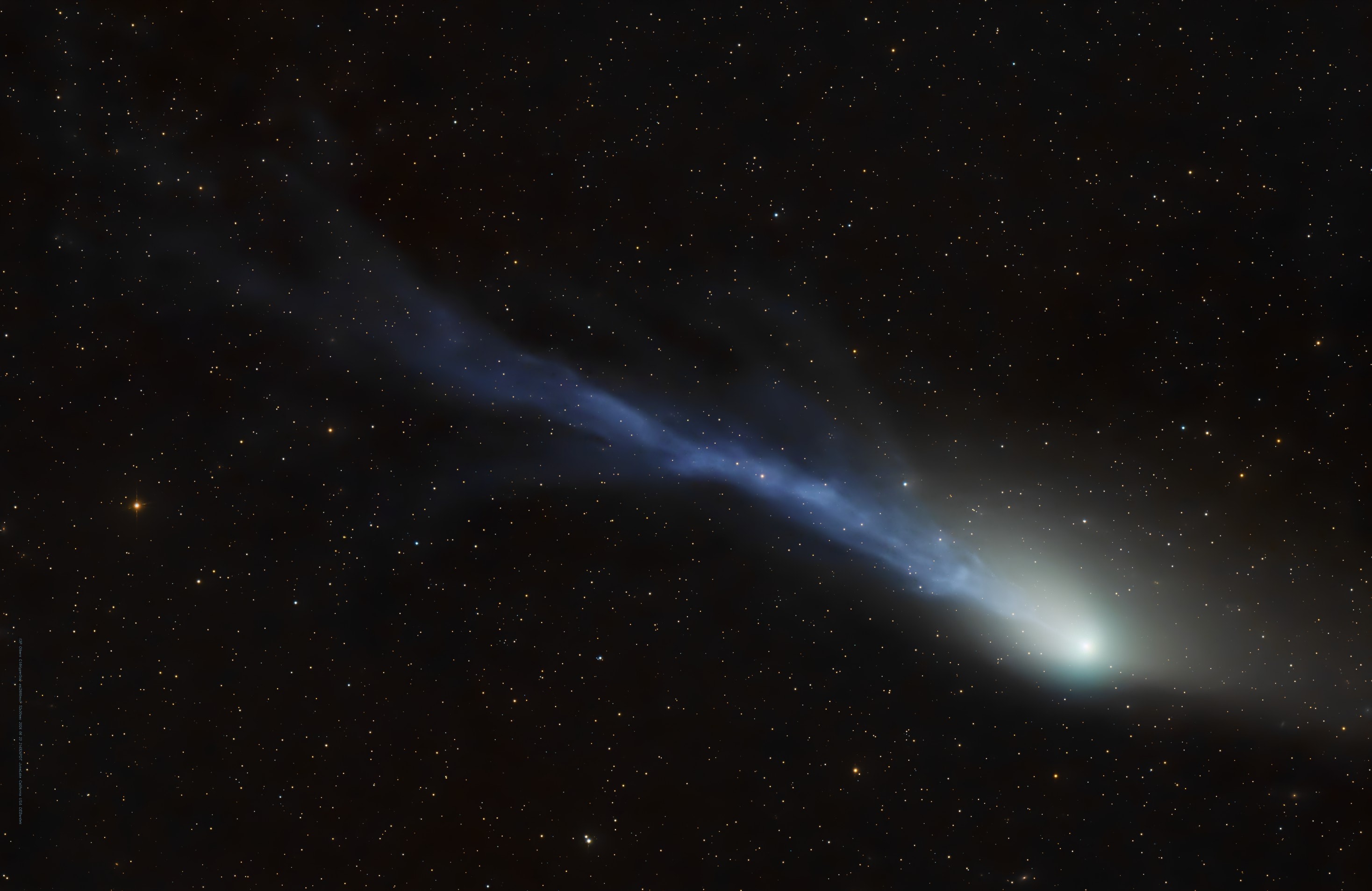 Not a paradox, Comet 13P/Olbers is returning to the inner Solar System after 68 years. The periodic, Halley-type comet will reach its next perihelion or closest approach to the Sun on June 30 and has become a target for binocular viewing low in planet Earth's northern hemisphere night skies. But this sharp telescopic image of 13P is composed of stacked exposures made on the night of June 25. It easily reveals shifting details in the bright comet's torn and tattered ion tail buffeted by the wind from an active Sun, along with a broad, fanned-out dust tail and slightly greenish coma. The frame spans over two degrees across a background of faint stars toward the constellation Lynx.