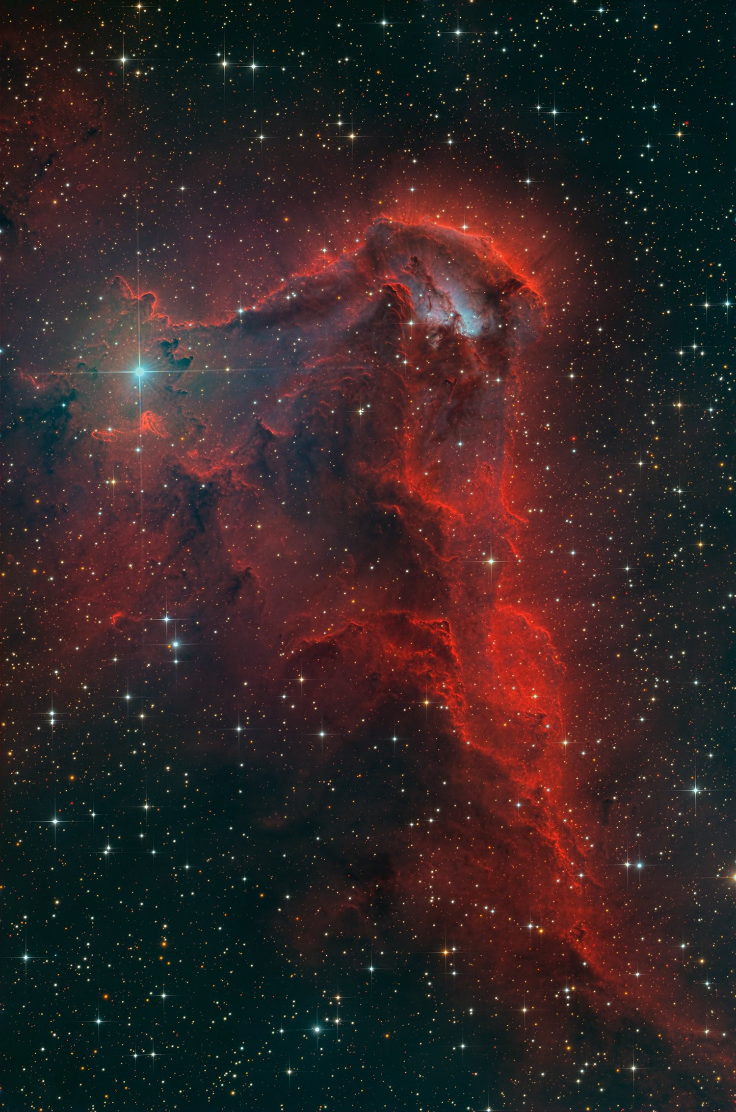 From the 1960 astronomical catalog of Rodgers, Campbell and Whiteoak, emission region RCW 85 shines in southern night skies between bright stars Alpha and Beta Centauri. About 5,000 light years distant, the hazy interstellar cloud of glowing hydrogen gas and dust is faint. But detailed structures along well-defined rims within RCW 85 are traced in this cosmic skyscape composed of 28 hours of narrow and broadband exposures. Suggestive of dramatic shapes in other stellar nurseries where natal clouds of gas and dust are sculpted by energetic winds and radiation from newborn stars, the tantalizing nebula has been called the Devil's Tower. This telescopic frame would span around 100 light-years at the estimated distance of RCW 85.